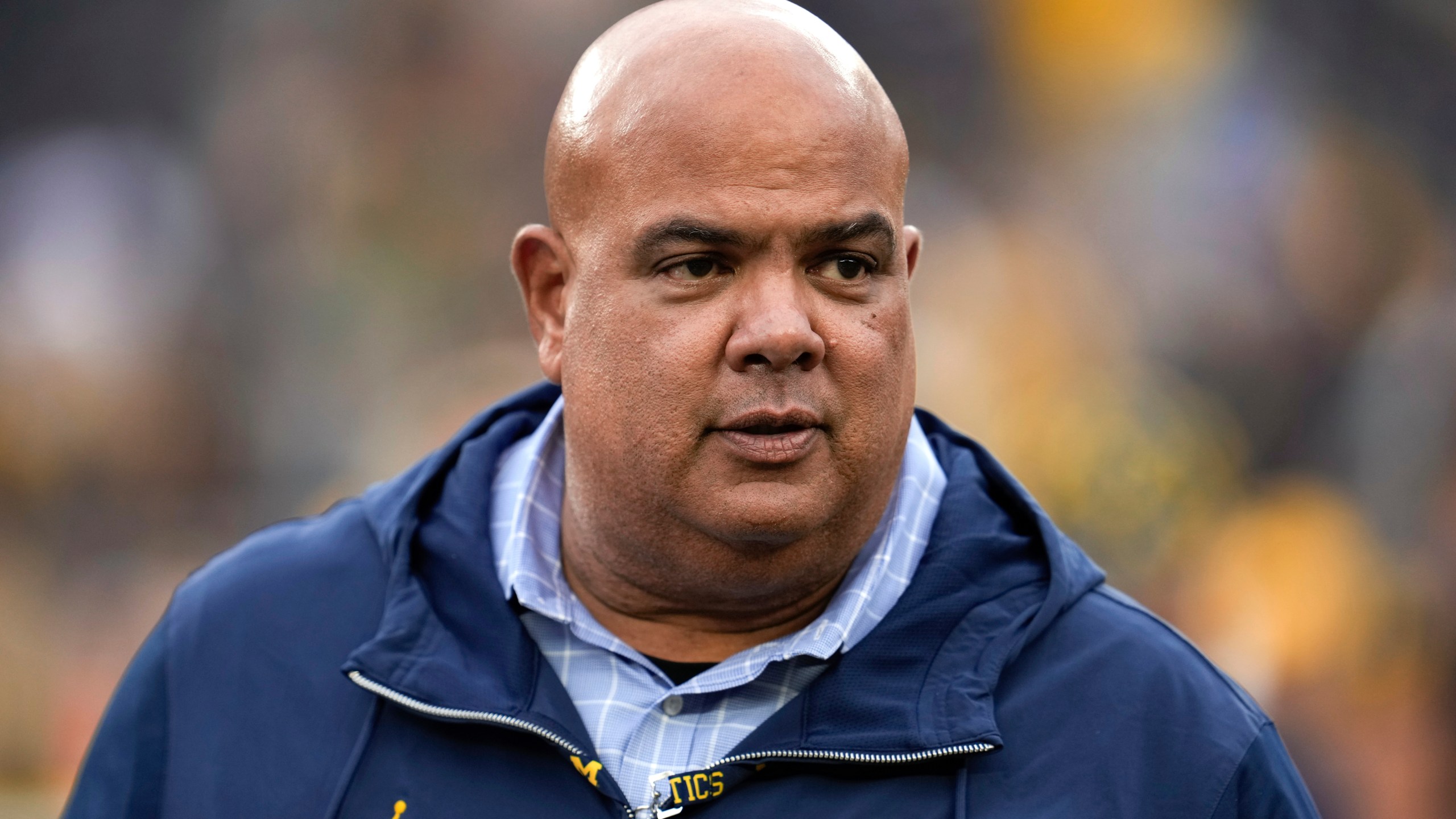 FILE - Michigan athletic director Warde Manuel watches in the second half of an NCAA college football game against UNLV in Ann Arbor, Mich., Sept. 9, 2023. (AP Photo/Paul Sancya, File)