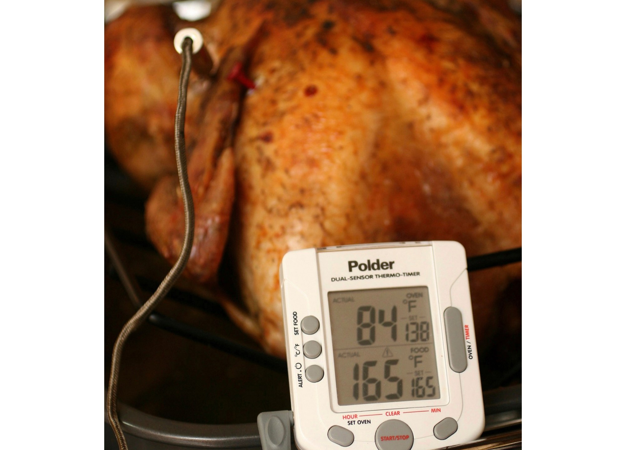 FILE - A turkey is roasted with the help of a thermometer on Oct. 18, 2007. (AP Photo/Larry Crowe, File)