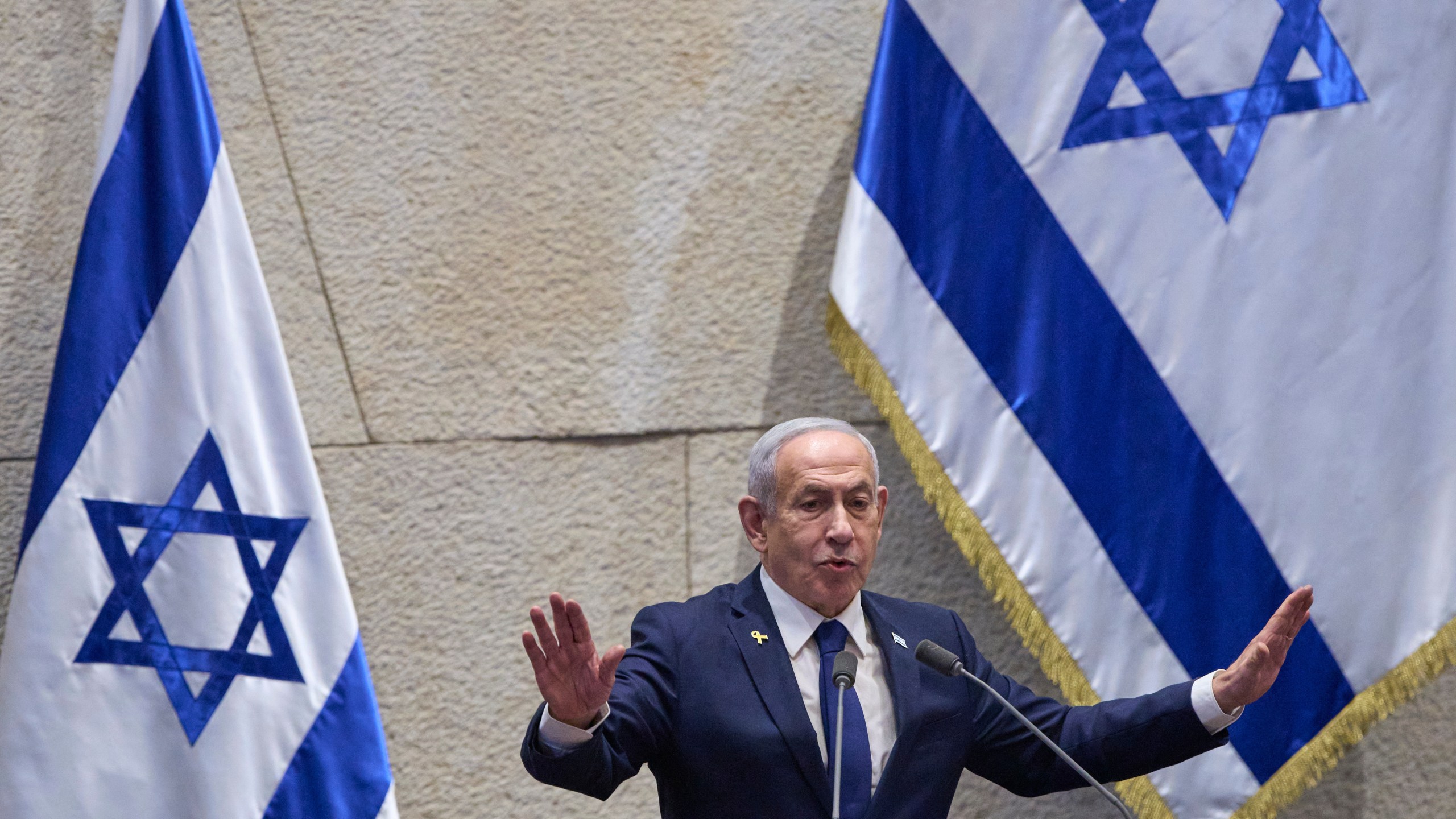 Israel's Prime Minister Benjamin Netanyahu addresses lawmakers in the Knesset, Israel's parliament, in Jerusalem, Monday, Nov. 10 2025. (AP Photo/Ohad Zwigenberg)