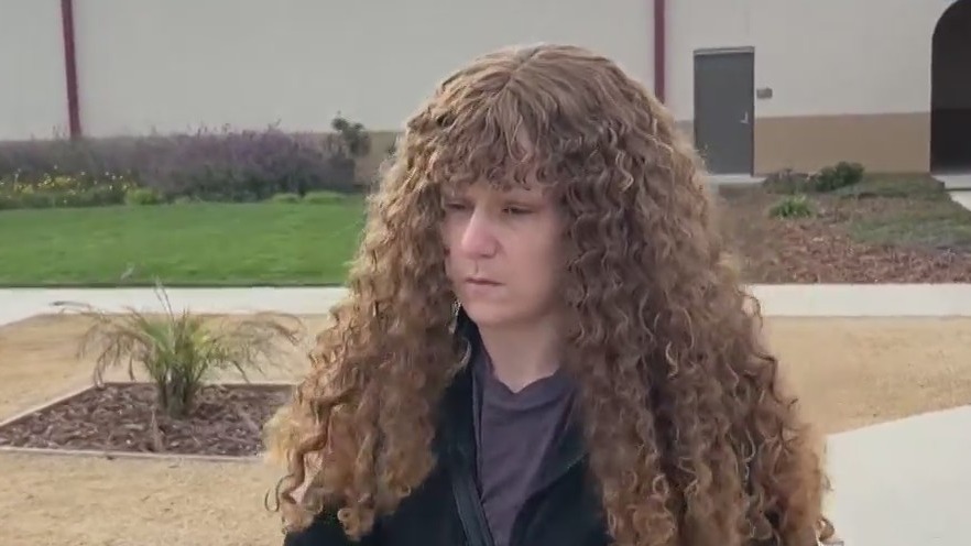 Ashlee Buzzard, the mother of missing 9-year-old Melodee Buzzard, outside court on Wednesday