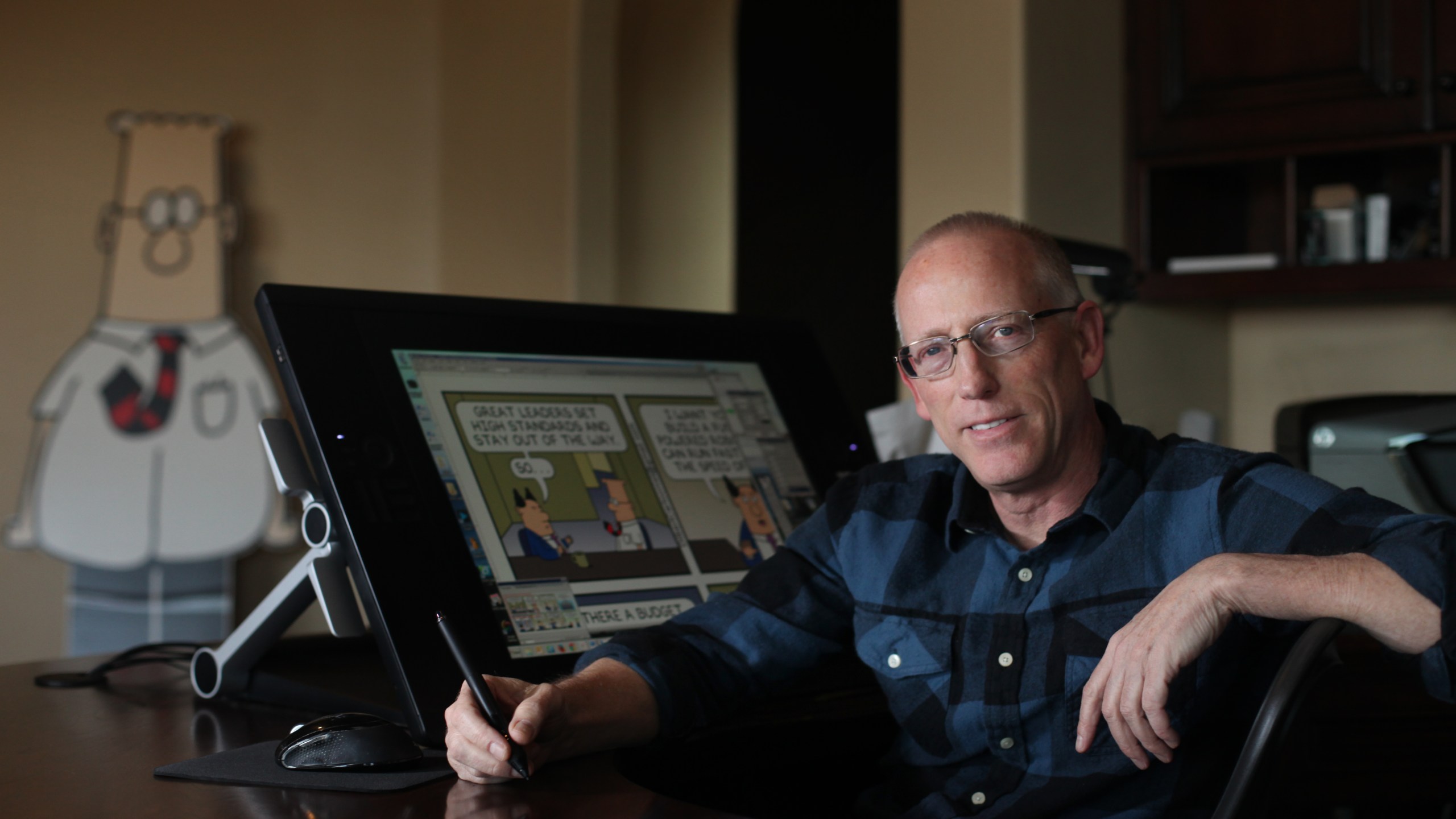 Scott Adams, 'Dilbert' creator, at drawing board in file photo