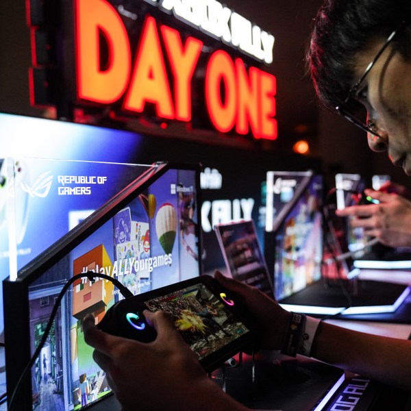 A gamer plays with a ROG Xbox Ally at the Gamescom Asia X Thailand Game Show 2025 in Bangkok, Thailand, on October 18, 2025.