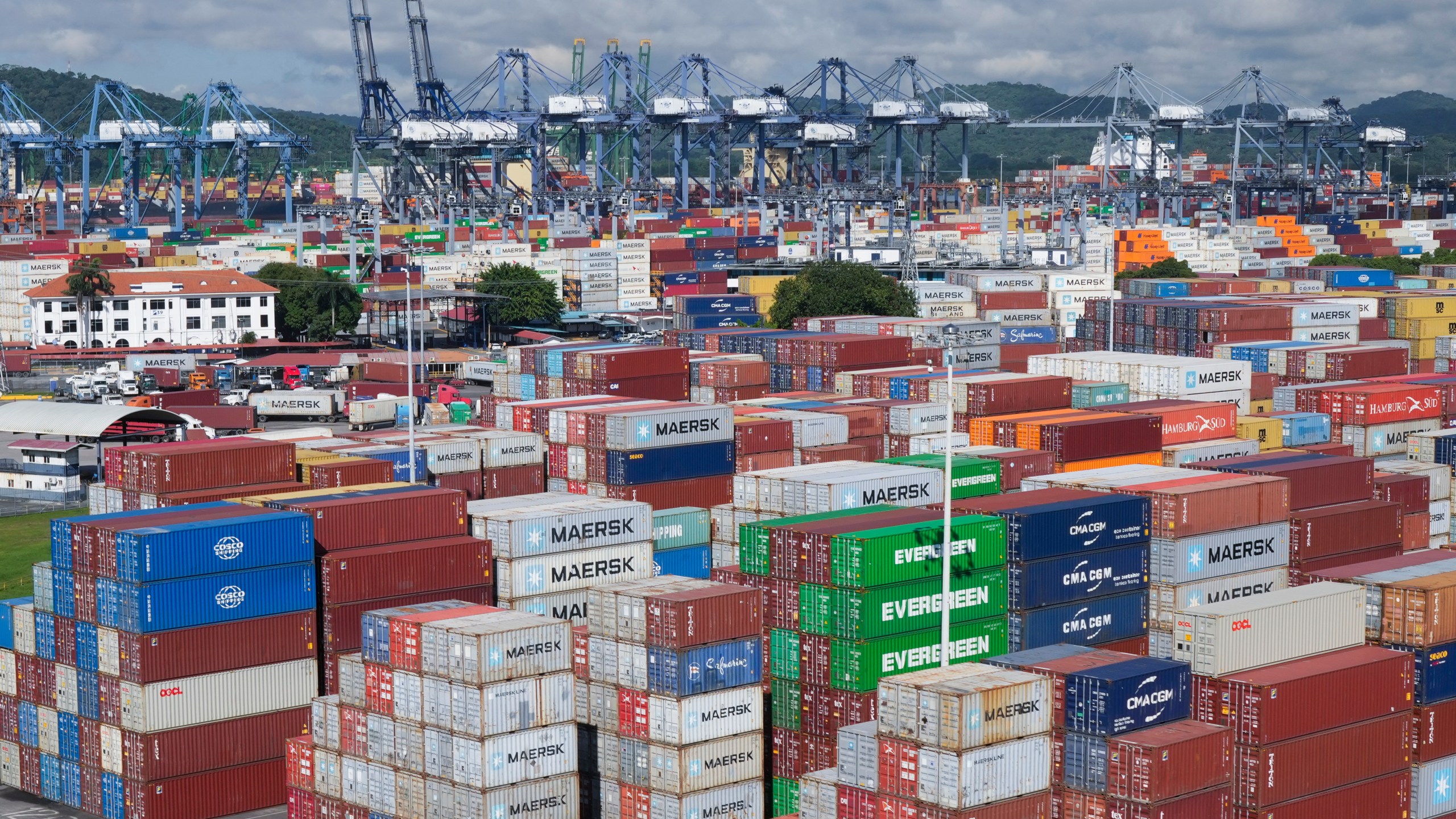 FILE - Ship containers are stacked at the Panama Canal Balboa port, operated by the Panama Ports Company, in Panama City, Sept. 20, 2025. (AP Photo/Matias Delacroix, File)