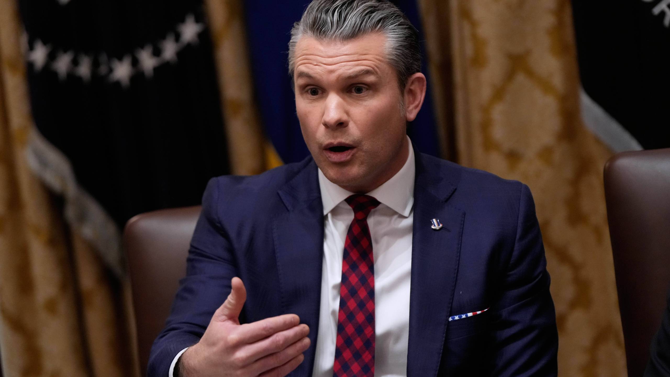 Defense Secretary Pete Hegseth speaks during a Cabinet meeting at the White House, Tuesday, Dec. 2, 2025, in Washington. (AP Photo/Julia Demaree Nikhinson)