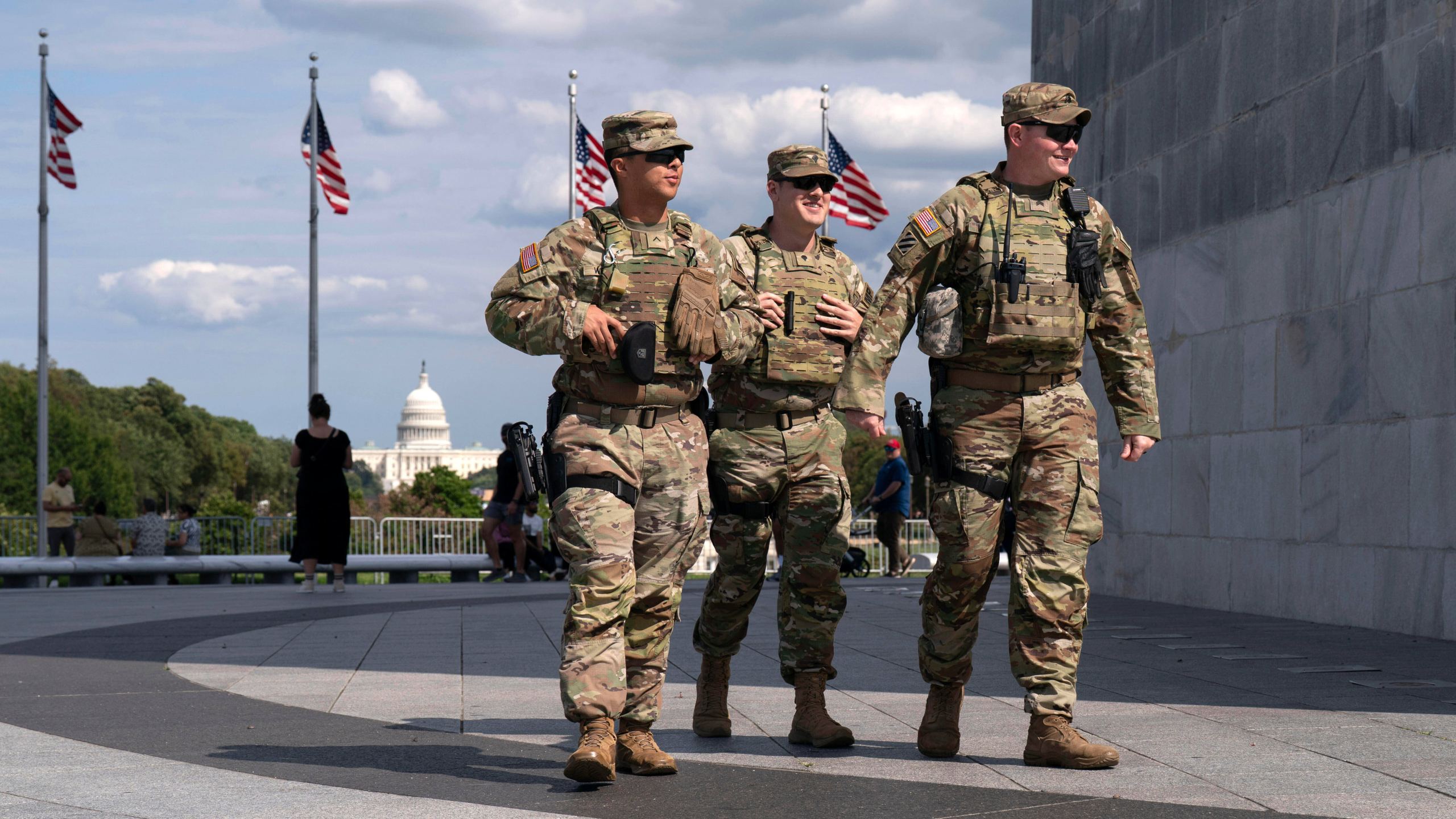 FILE - Members of the Louisiana National Guard patrol the grounds of the Washington Monument at the National Mall, Sept. 7, 2025, in Washington. (AP Photo/Jose Luis Magana, File)