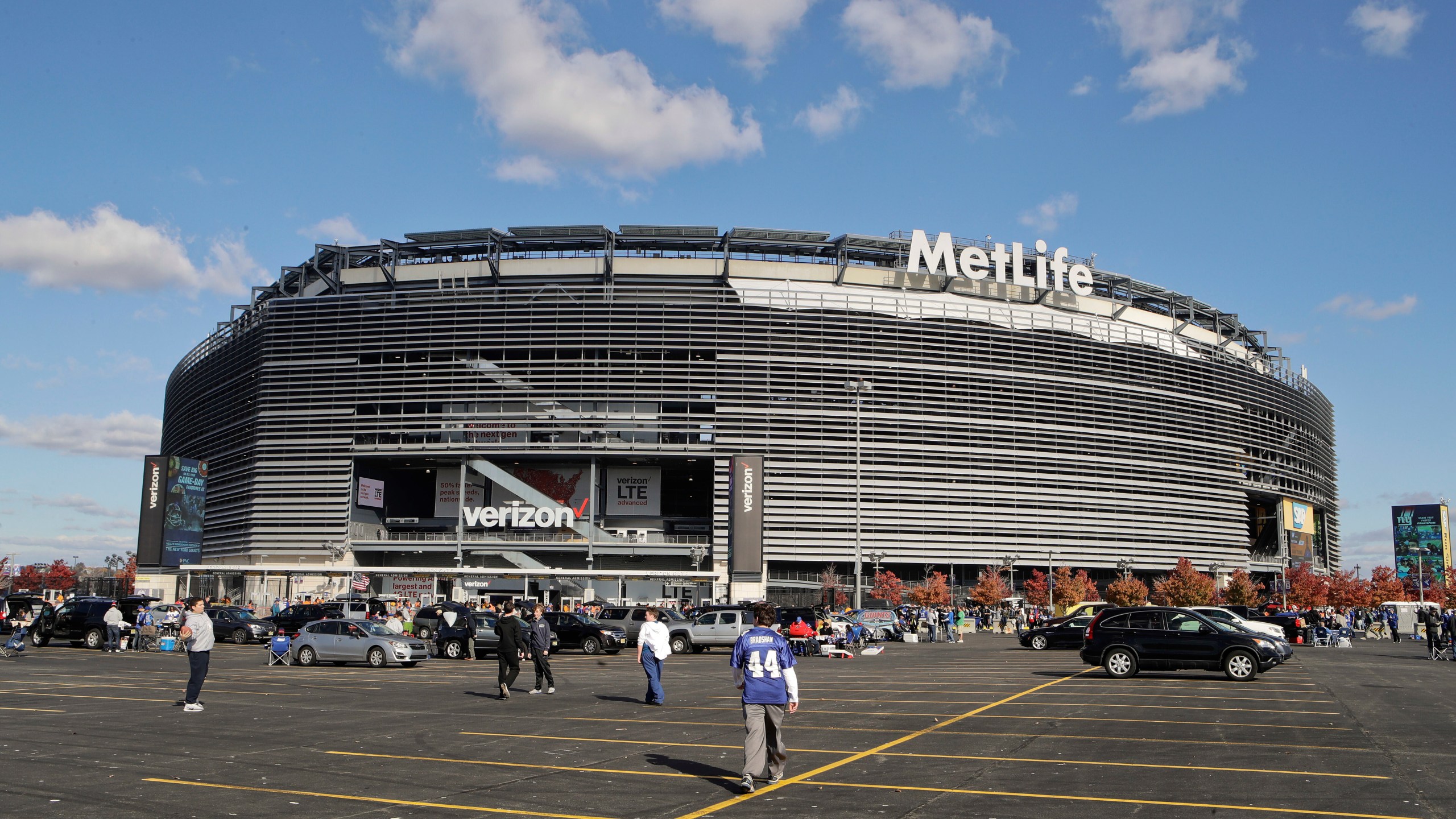 FILE - Tailgaters gather outside MetLife Stadium before an NFL football game between the New York Giants and the Philadelphia Eagles, Sunday, Nov. 6, 2016, in East Rutherford, N.J. (AP Photo/Frank Franklin II, File)