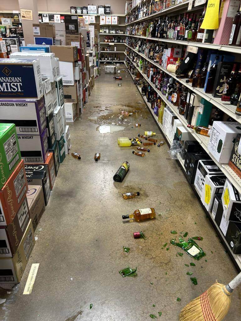 In this photo provided by Samantha Martin, broken bottles are seen after a raccoon enters a liquor store on Saturday, Nov. 29, 2025, in Ashland, Va. (Samantha Martin/Hanover County Protection via AP)