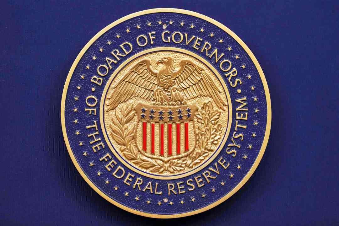 FILE - A seal is seen before Federal Reserve Chairman Jerome Powell walks out to speak during a news conference following the Federal Open Market Committee meeting, Sept. 17, 2025, at the Federal Reserve Board Building in Washington. (AP Photo/Jacquelyn Martin, File)