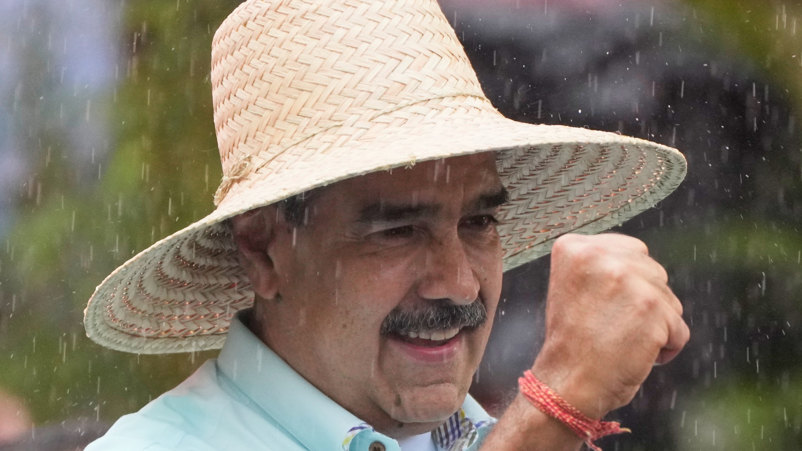 President Nicolas Maduro addresses supporters during a rally marking the anniversary of the Battle of Santa Ines, which took place during Venezuela's 19th-century Federal War, in Caracas, Venezuela, Wednesday, Dec. 10, 2025. (AP Photo/Ariana Cubillos)