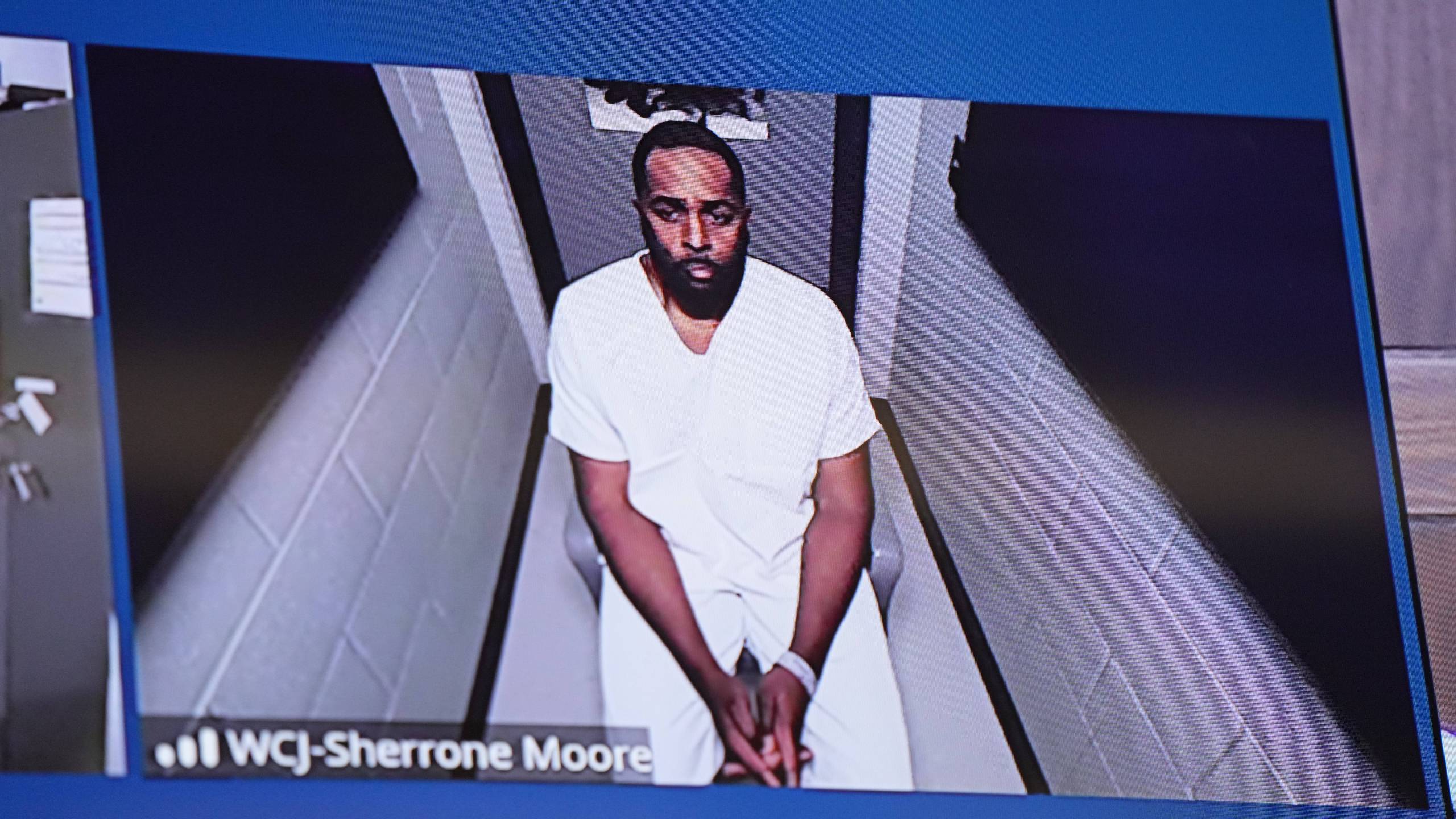 Fired Michigan football coach Sherrone Moore appears via video in court on Friday, Dec. 12, 2025 in Ann Arbor, Mich. (AP Photo/ Ryan Sun, Pool)