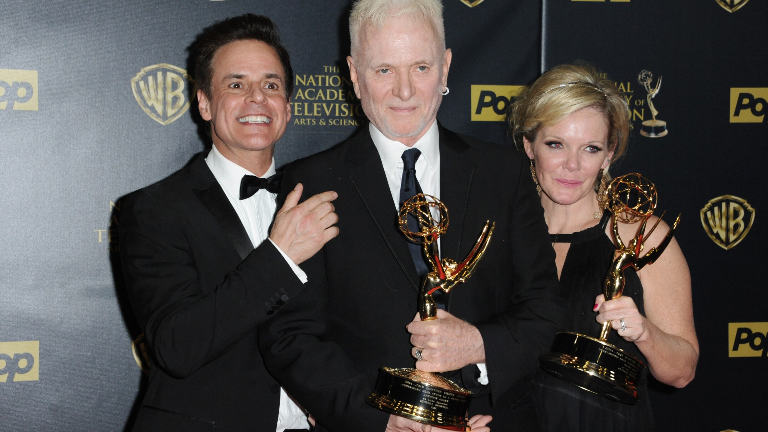 FILE - Christian Jules Le Blanc, left, poses with Anthony Geary and Maura West, right, winners of the awards for outstanding lead actor and actress in a drama series for "General Hospital", at the 42nd annual Daytime Emmy Awards at Warner Bros. Studios, April 26, 2015, in Burbank, Calif. (Photo by Richard Shotwell/Invision/AP, File)