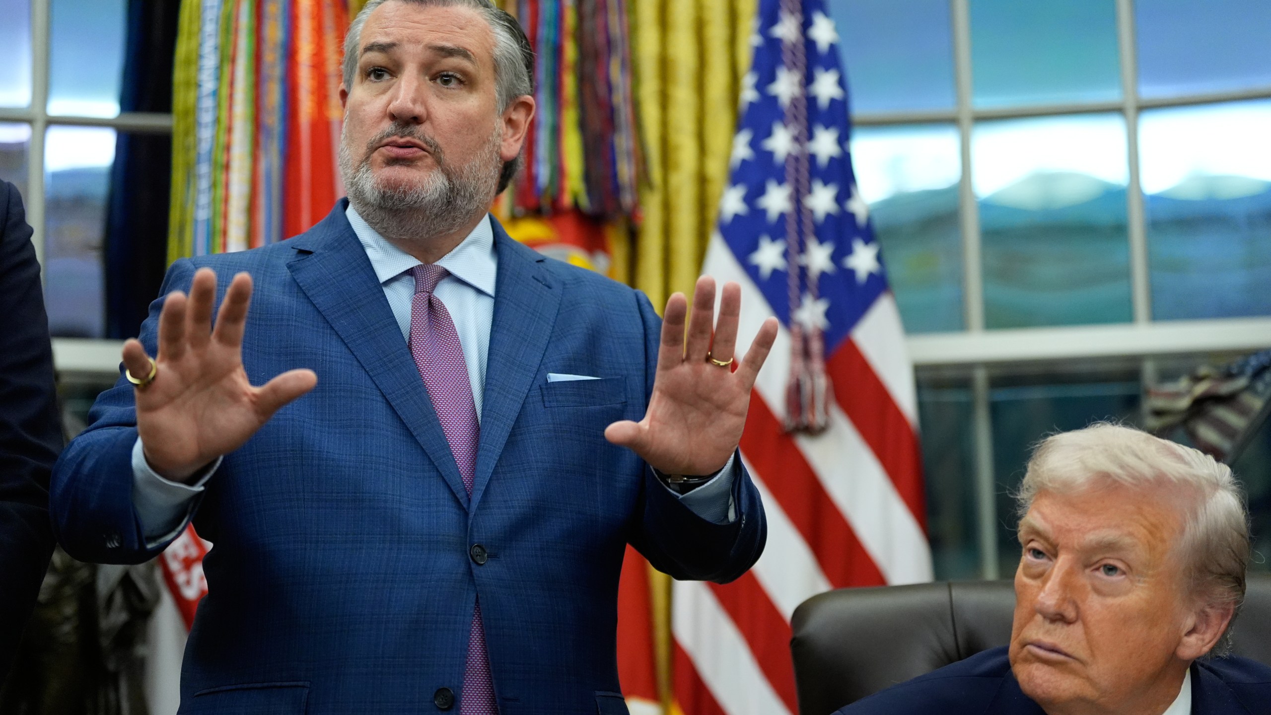 Ted Cruz R-Texas, left, speaks during a signing ceremony regarding AI initiatives with President Donald Trump in the Oval Office of the White House, Thursday, Dec. 11, 2025, in Washington. (AP Photo/Alex Brandon)