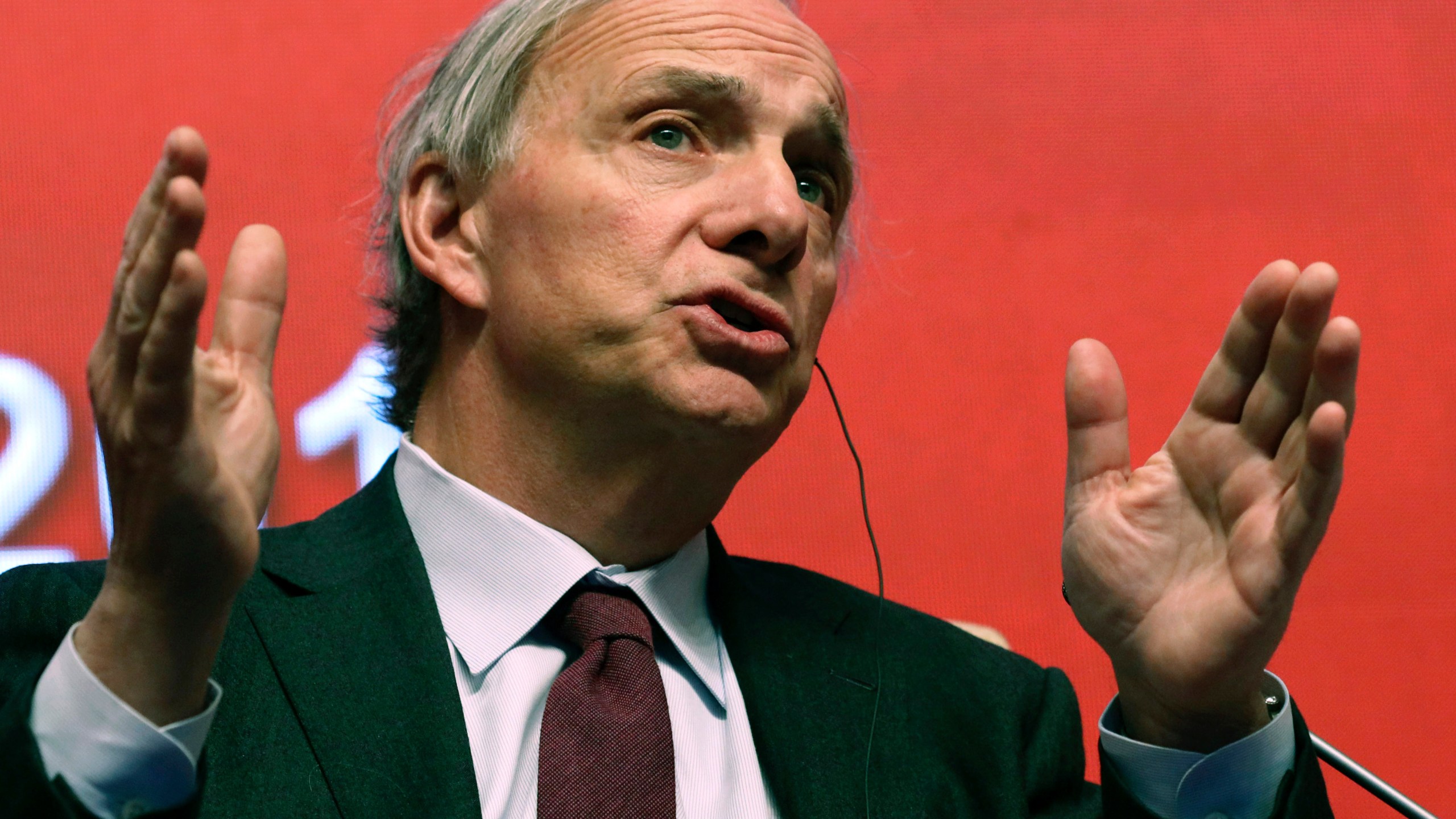 FILE - Bridgewater Associates Chairman Ray Dalio speaks during the Economic Summit held for the China Development Forum in Beijing on March 23, 2019. (AP Photo/Ng Han Guan, File)