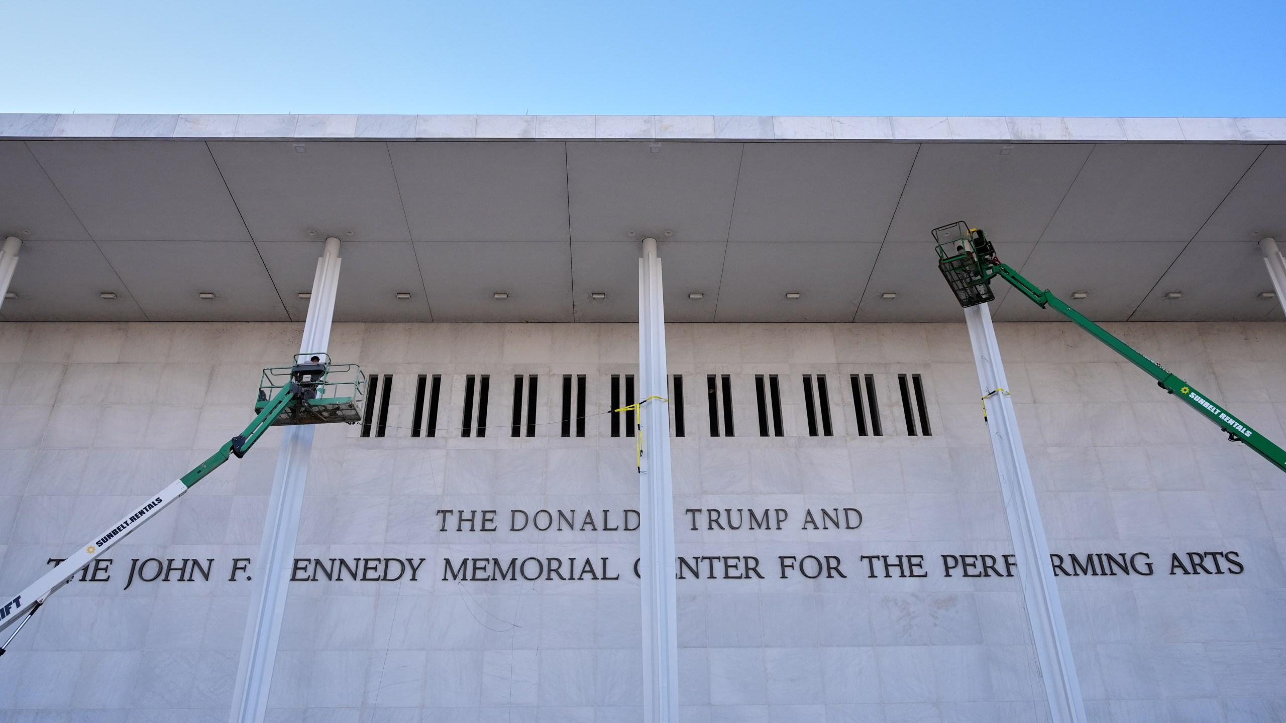 New signage, The Donald J. Trump and The John F. Kennedy Memorial Center For The Performing Arts, is unveiled on the Kennedy Center, Friday, Dec. 19, 2025, in Washington. (AP Photo/Jacquelyn Martin)