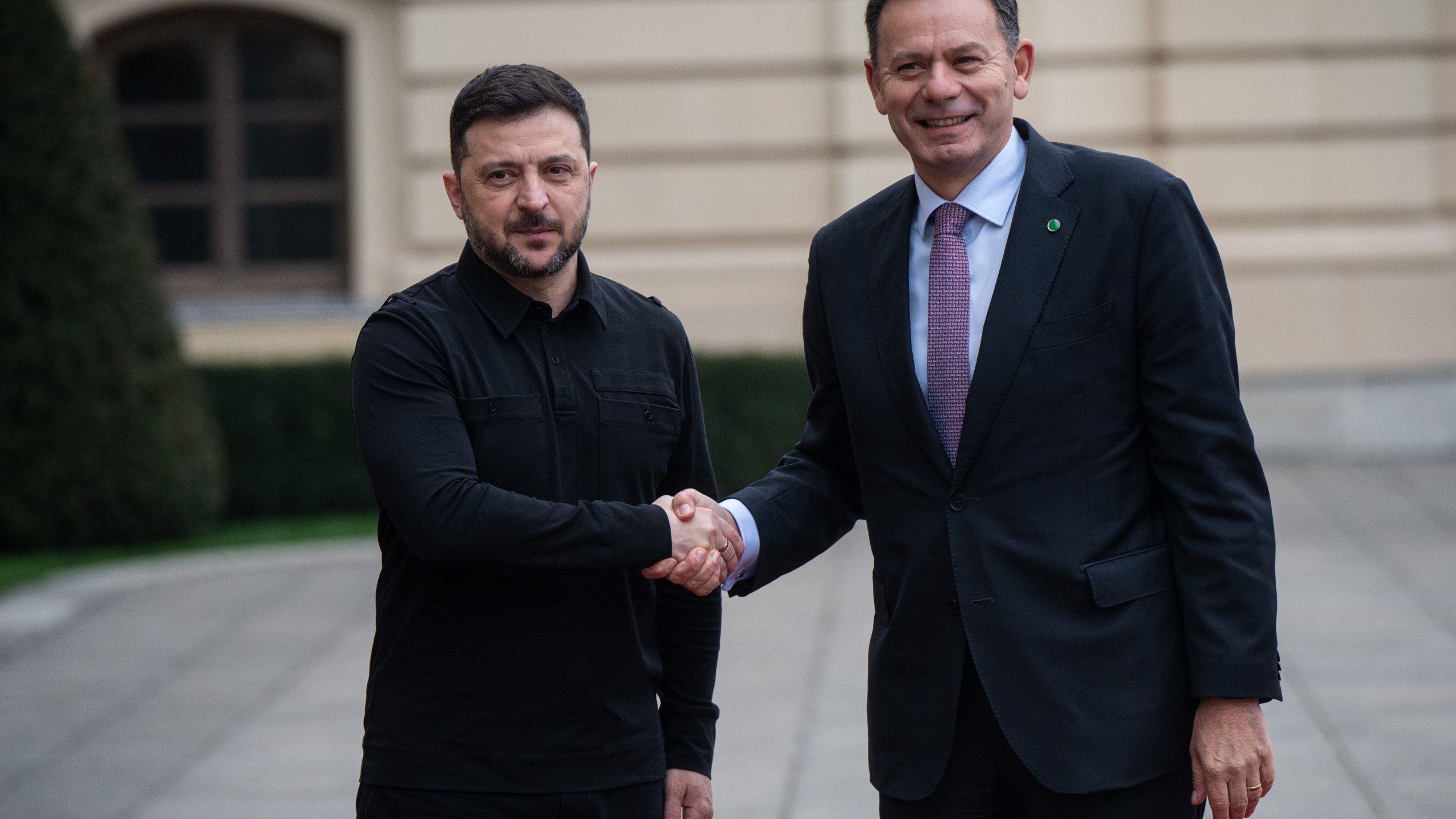 Ukraine's President Volodymyr Zelenskyy, left, shakes hands with Portuguese Prime Minister Luís Montenegro in Kyiv, Ukraine, Saturday, Dec. 20, 2025. (AP Photo/Danylo Antoniuk)