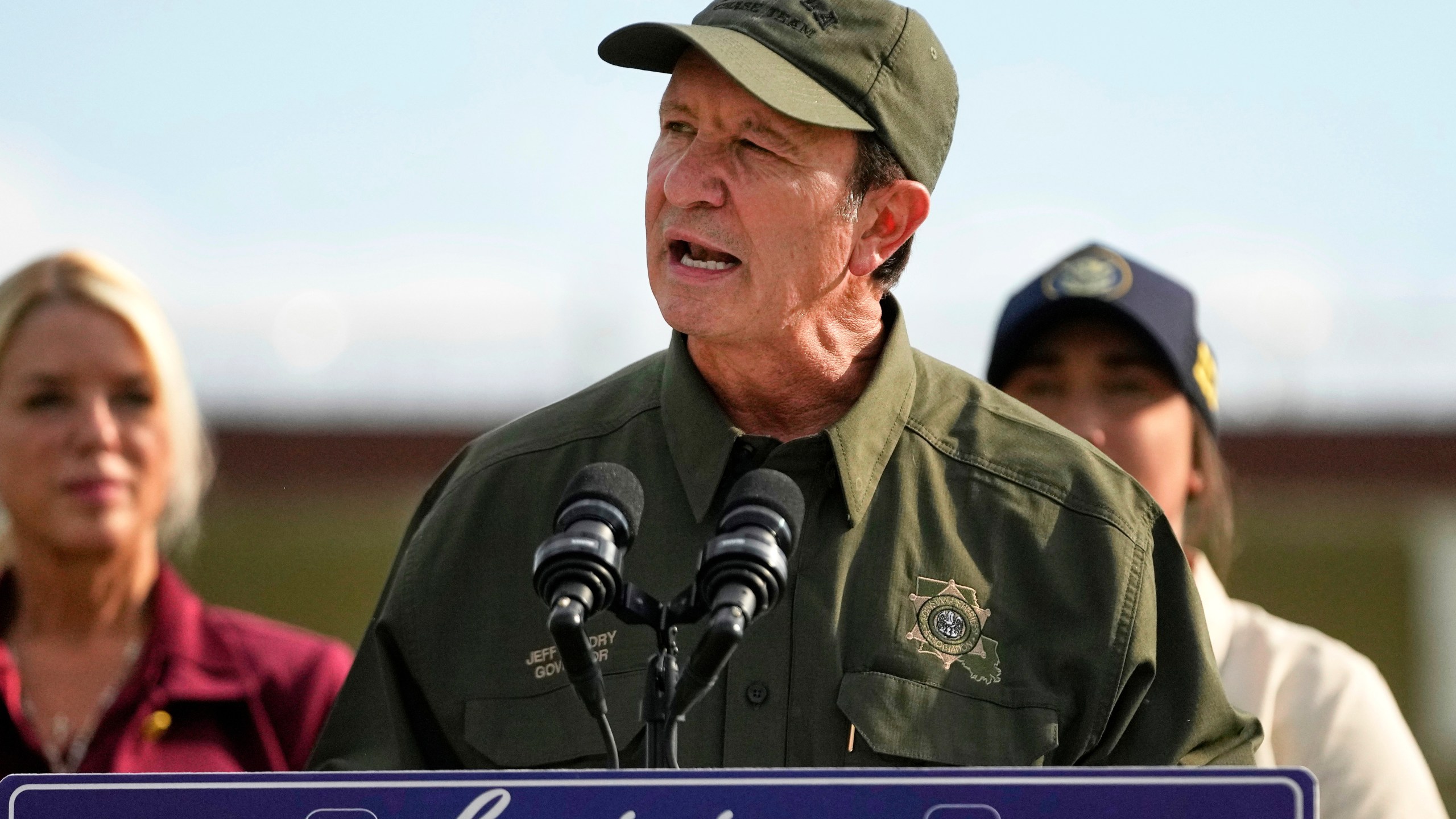FILE - Louisiana Gov. Jeff Landry speaks to reporters at the Louisiana State Penitentiary in Angola, La., Sept. 3, 2025. (AP Photo/Gerald Herbert, File)