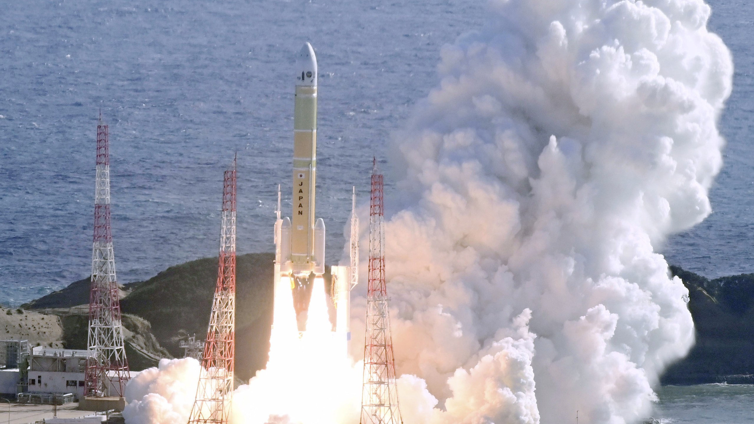 The H3 rocket (8th) by the Japan Aerospace Exploration Agency (JAXA), carrying a navigation satellite, is launched from the Tanegashima Space Center in Minamitane, Tanegashima island, southern Japan Monday, Dec.22, 2025. (Kyodo News via AP)