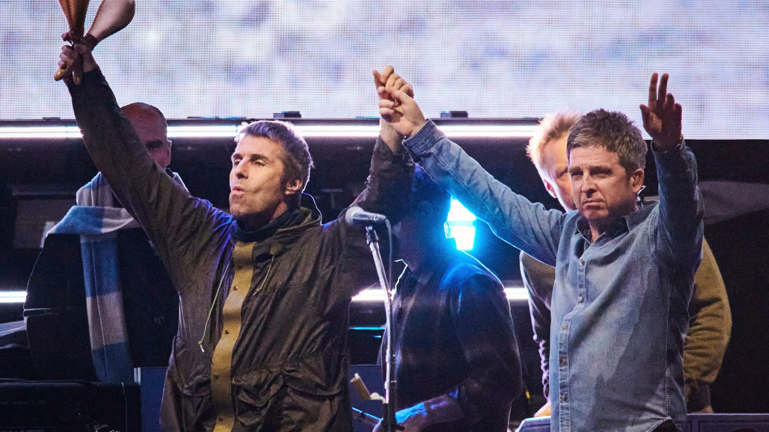 FILE - Liam Gallagher, left, and Noel Gallagher of Oasis appear during their reunion tour in Toronto on Aug. 24, 2025. (Sammy Kogan/The Canadian Press via AP)