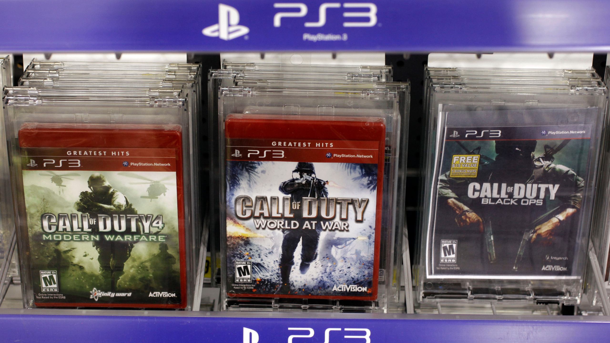 FILE - Three versions of Activision's Call Of Duty games are seen on sale at Best Buy in Mountain View, Calif., Wednesday, Aug. 3, 2011. Vincent Zampella, one of the creators behind such best-selling video games "Call of Duty," has died at 55. (AP Photo/Paul Sakuma,File)