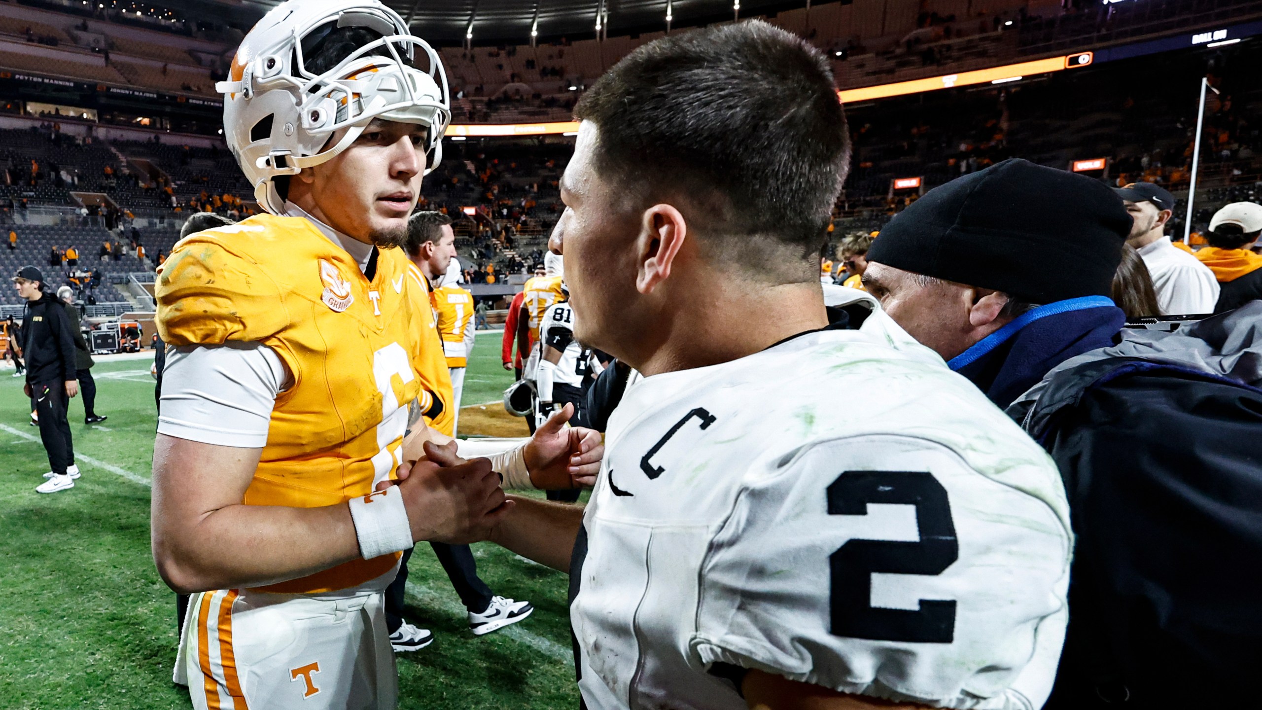 Vanderbilt quarterback Diego Pavia (2) shakes hands with Tennessee quarterback Joey Aguilar (6) after an NCAA college football game Saturday, Nov. 29, 2025, in Knoxville, Tenn. (AP Photo/Wade Payne)