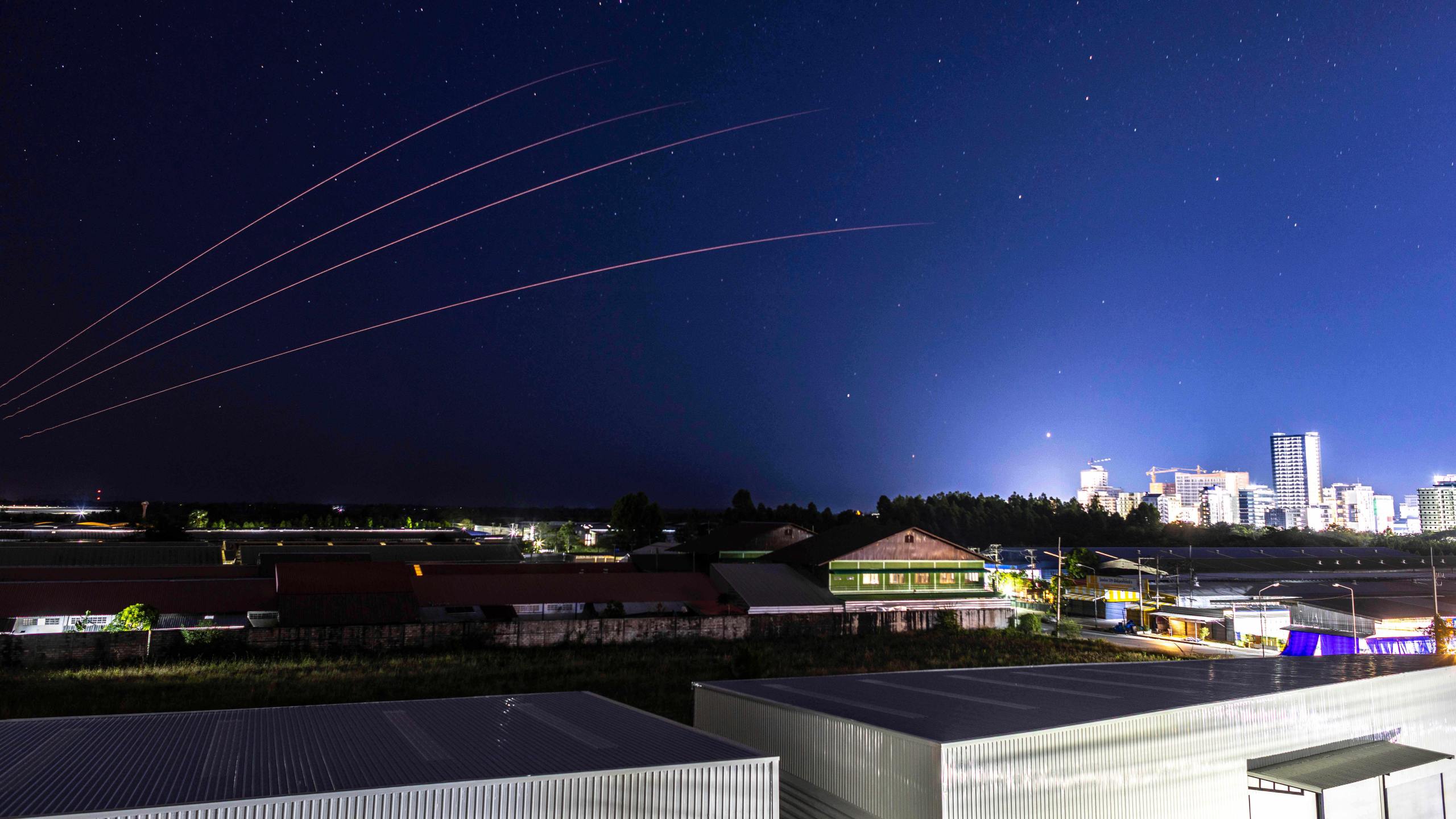 The Thai military fires artillery towards Cambodia, Friday, Dec. 26, 2025, seen from Thailand's Sa Kaeo province. (AP Photo/Wason Wanichakorn)