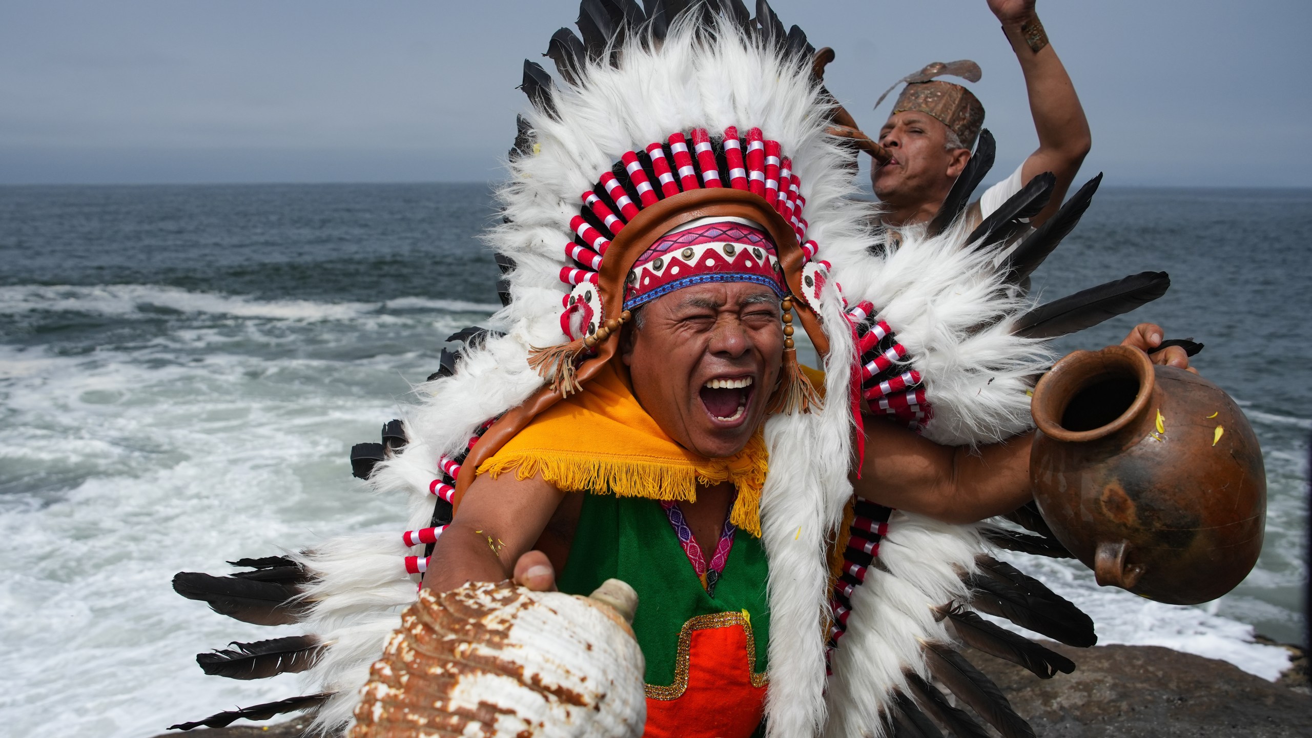 Shamans perform an annual ritual to predict political and social issues for the new year in Lima, Peru, Monday, Dec. 29, 2025. (AP Photo/Guadalupe Pardo)