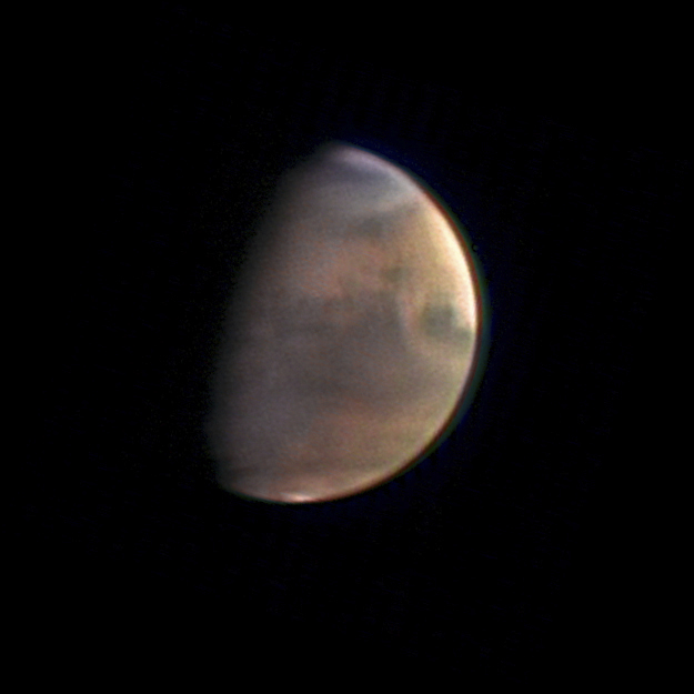 An image of Mars, an orange and blue hue