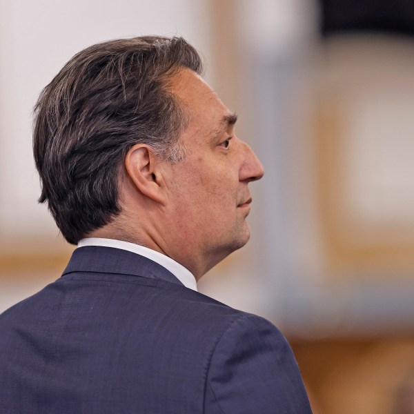 Brian Walshe stands in court.