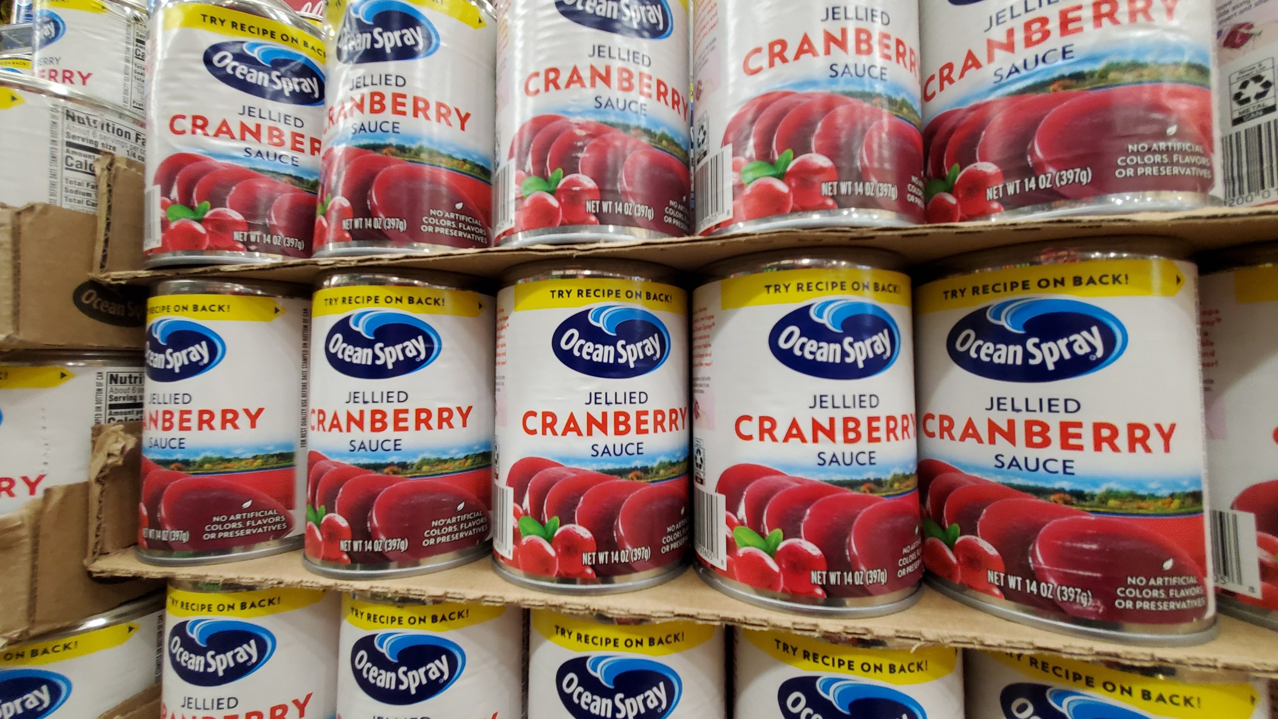 A stack of cranberry sauce cans from the brand Ocean Spray