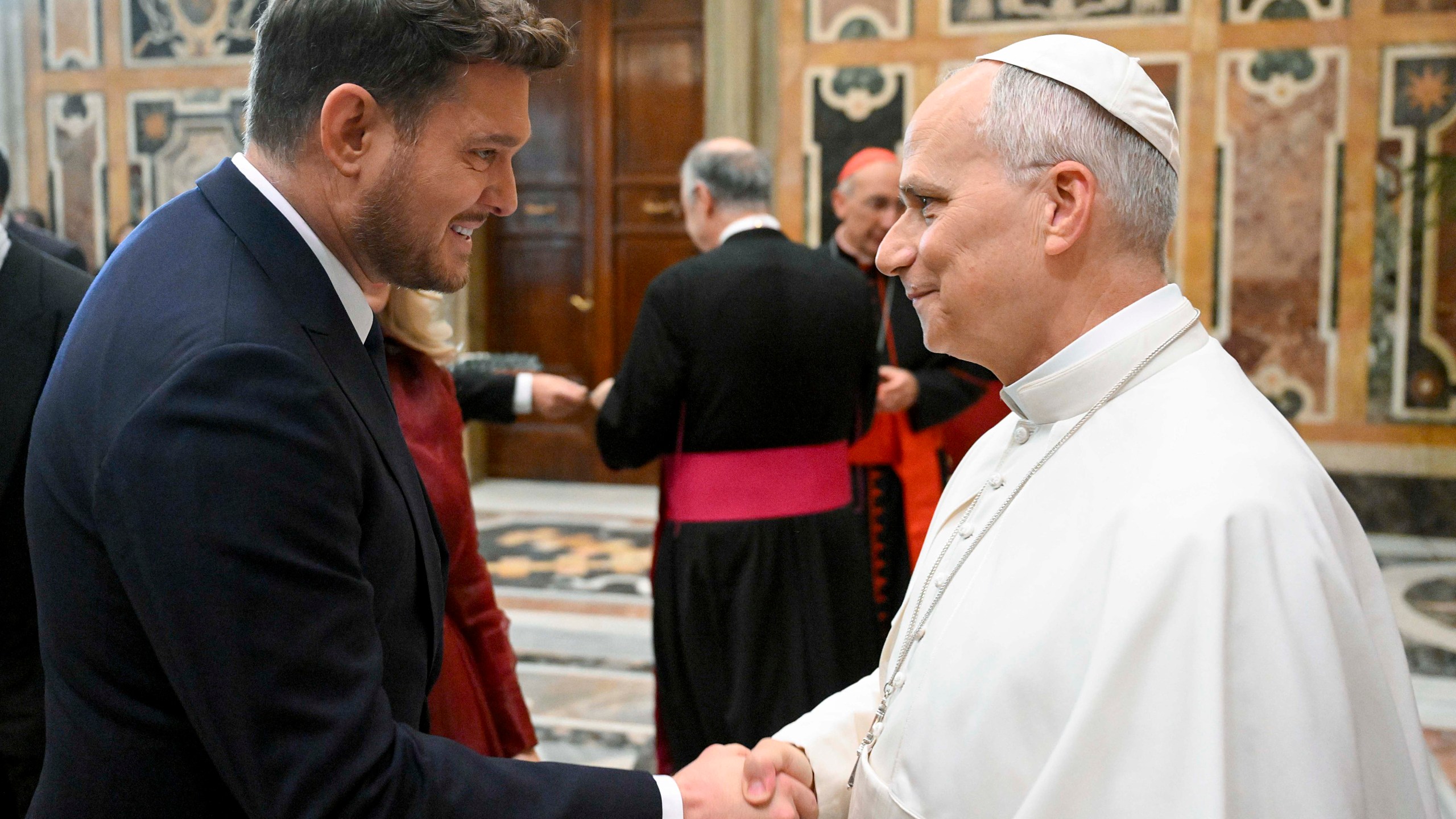 Pope Leo XIV greets singer Michael Bublé