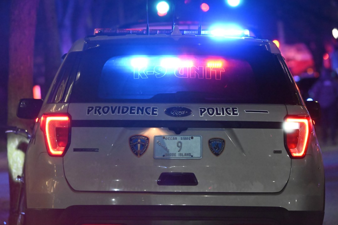 Back of Providence police vehicle with emergency lights