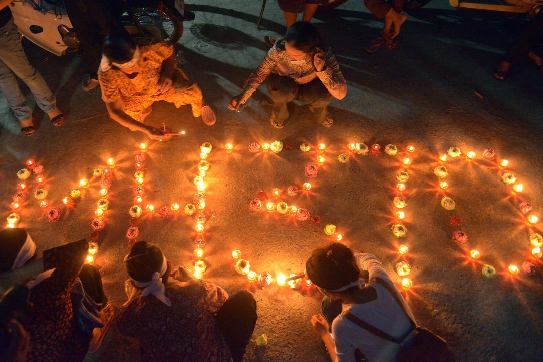 Candles spell out "MH370" at a memorial