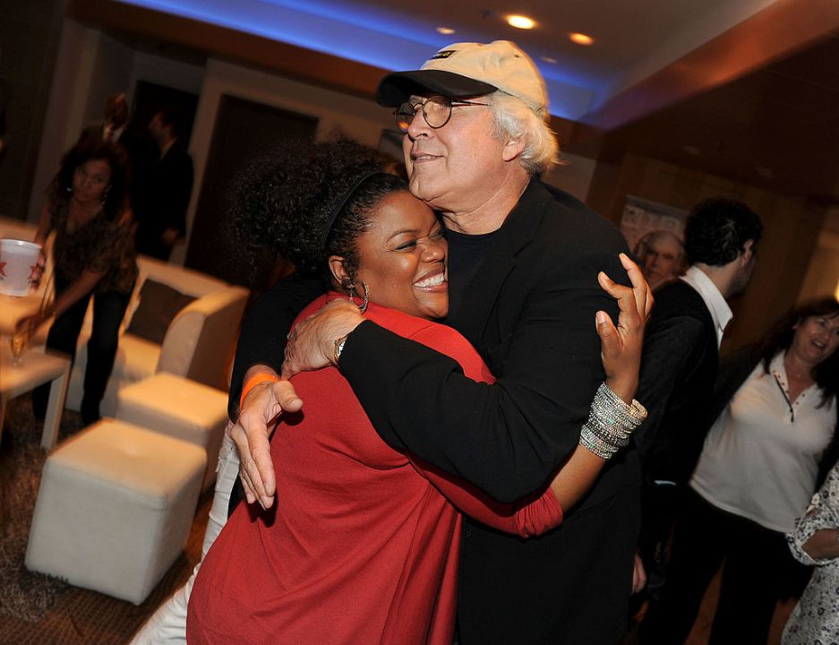 Yvette Nicole Brown and Chevy Chase hugging
