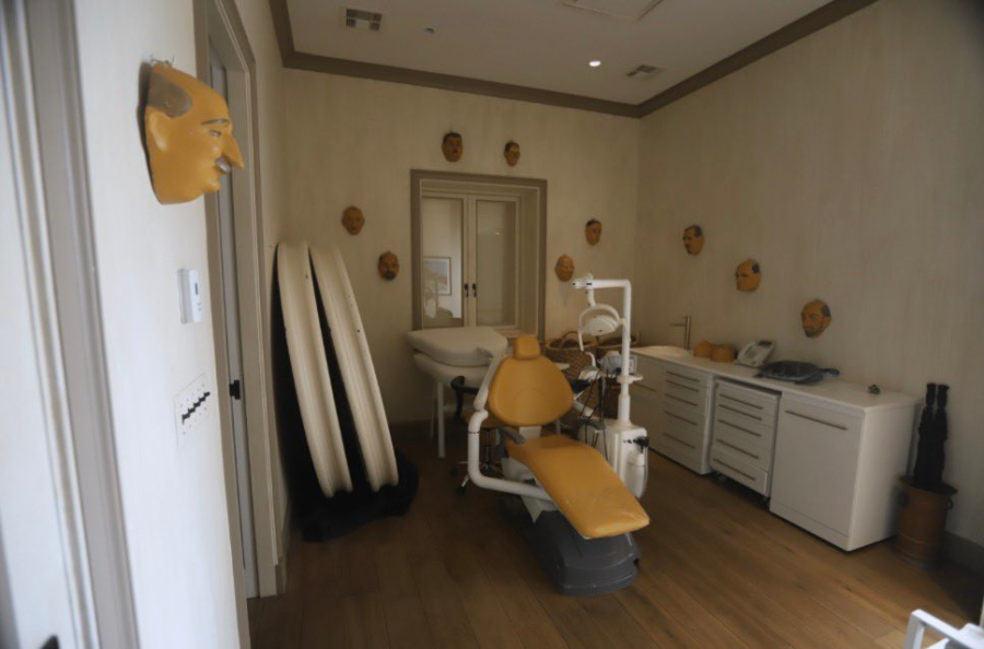 A dental chair in a room