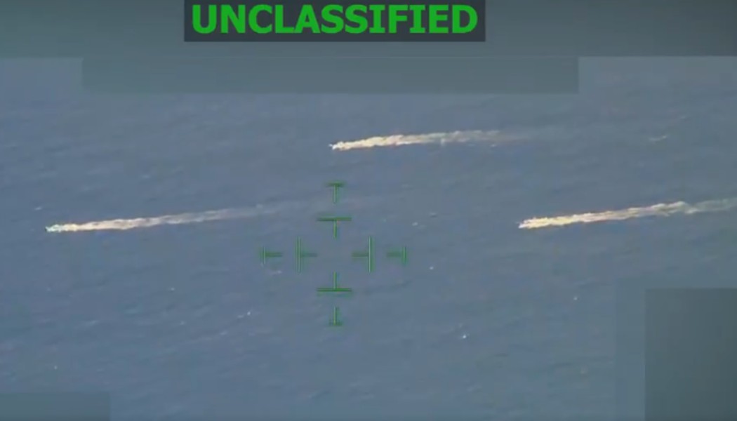 screen grab of three alleged drug boats from a distance