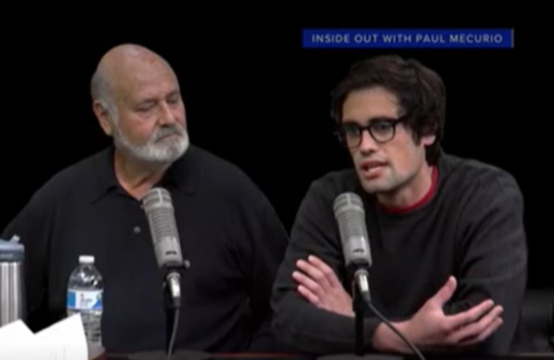 Reiner father and son with microphones at podcast taping