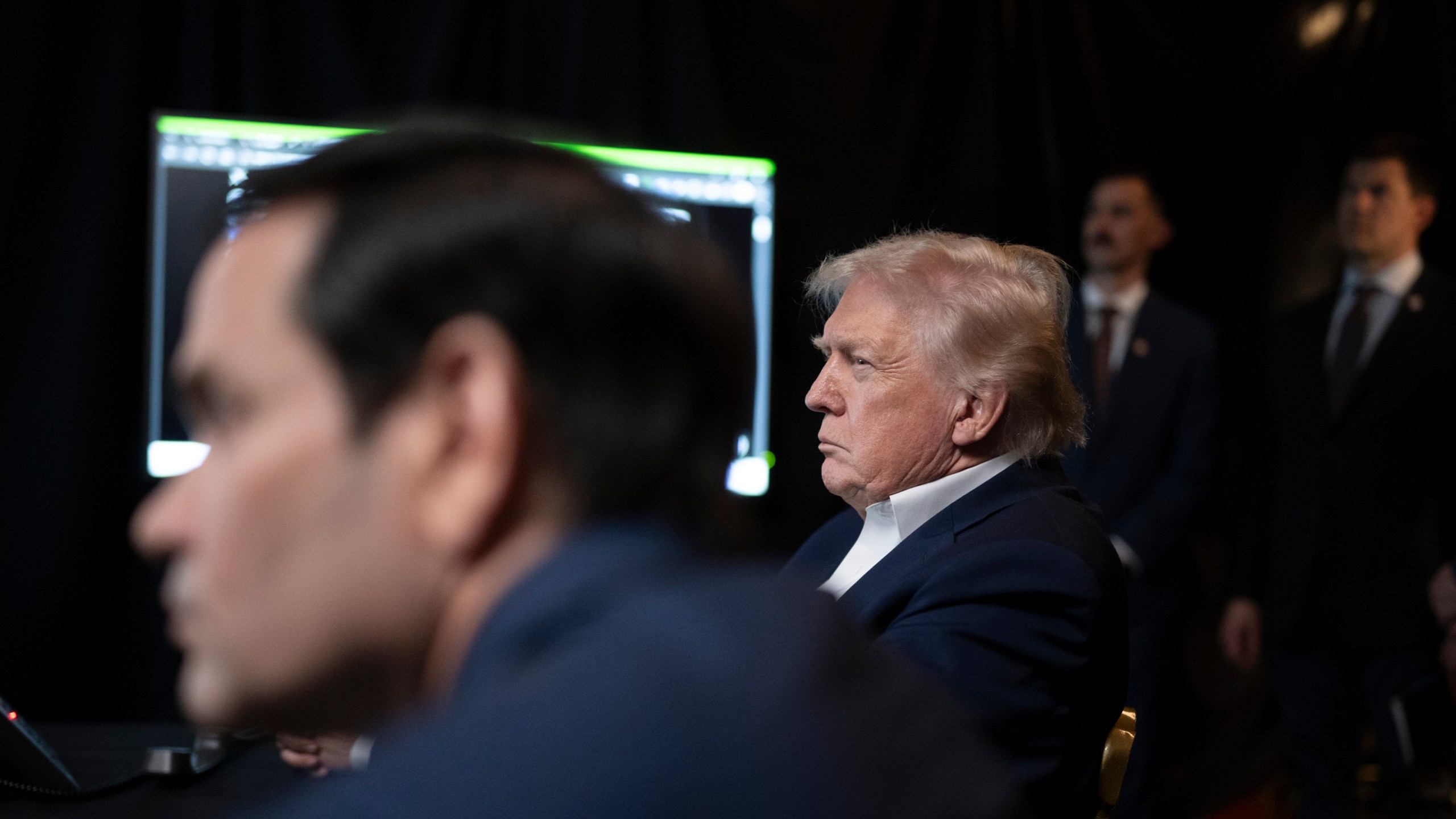 In this photo released by the White House, President Donald Trump monitors U.S. military operations in Venezuela, with Secretary of State Marco Rubio at Mar-a-Lago in Palm Beach, Fla., Saturday, Jan. 3, 2026. (Molly Riley/The White House via AP)