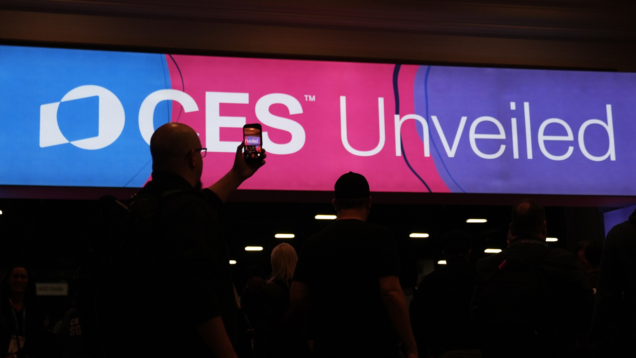 People arrive at the CES Unveiled tech show Sunday, Jan. 4, 2026, in Las Vegas. (AP Photo/Abbie Parr)
