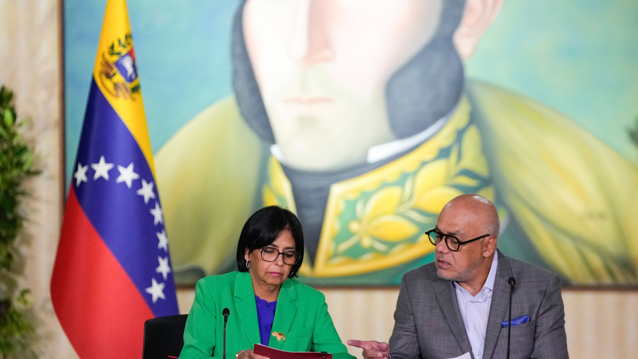 FILE - Venezuelan Vice President Delcy Rodriguez meets with her brother, National Assembly President Jorge Rodriguez at the Foreign Ministry in Caracas, Venezuela, Dec. 11, 2023. (AP Photo/Matias Delacroix, File)