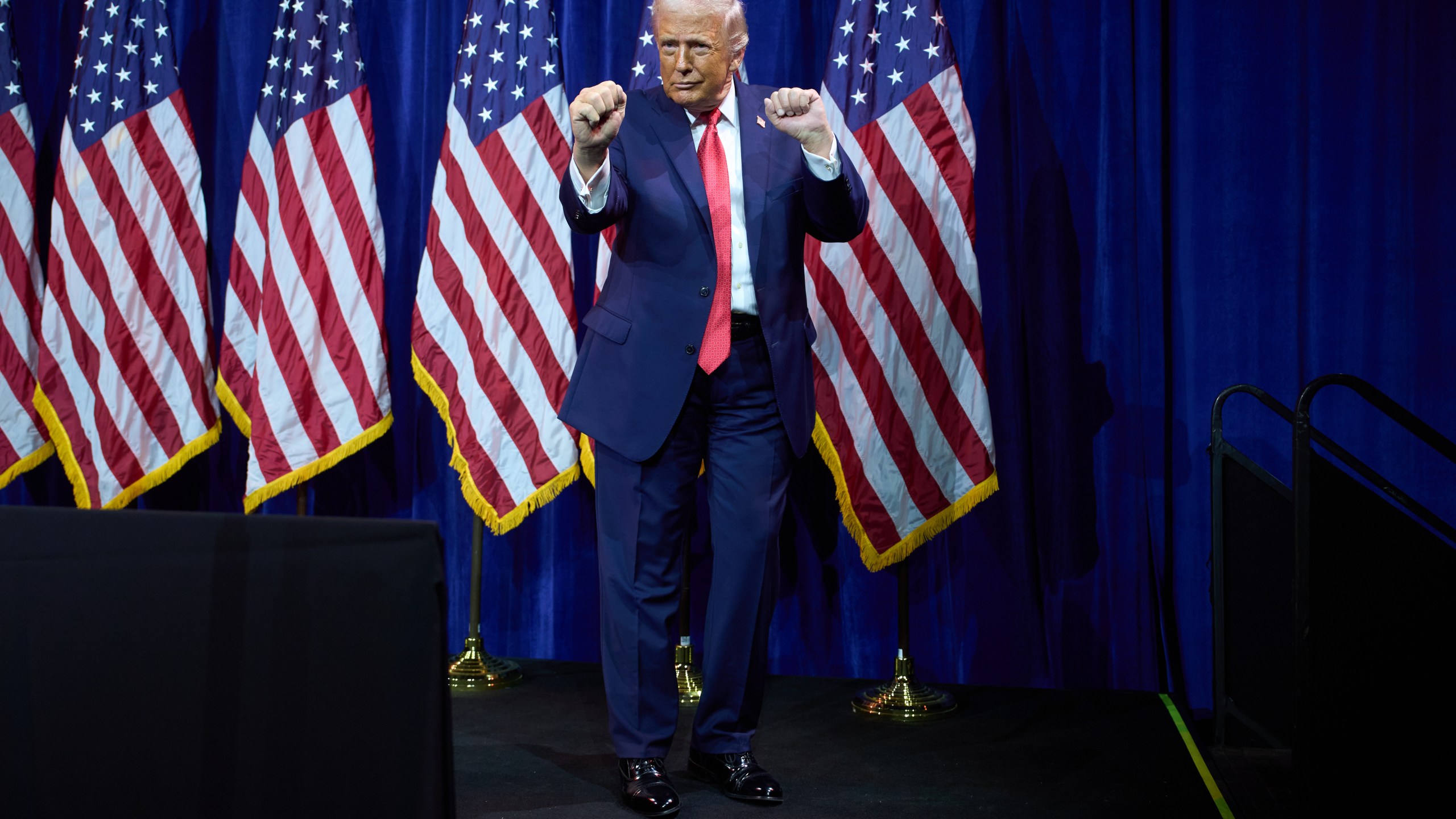 President Donald Trump dances as he walks off stage after speaking to House Republican lawmakers during their annual policy retreat, Tuesday, Jan. 6, 2026, in Washington. (AP Photo/Evan Vucci)
