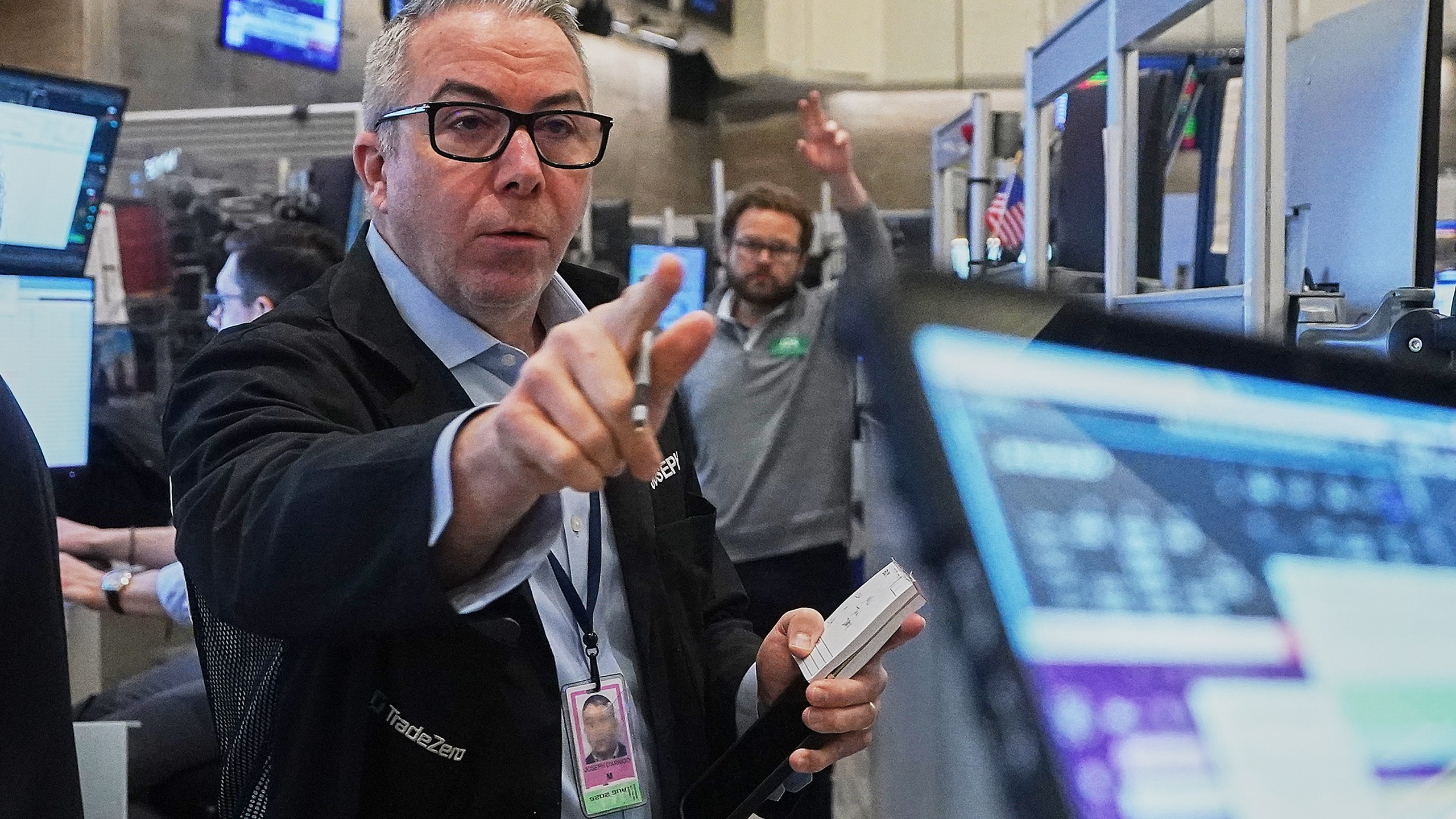 Options trader Joseph D'Arrigo works on the floor of the New York Stock Exchange, Wednesday, Jan. 7, 2026. (AP Photo/Richard Drew)
