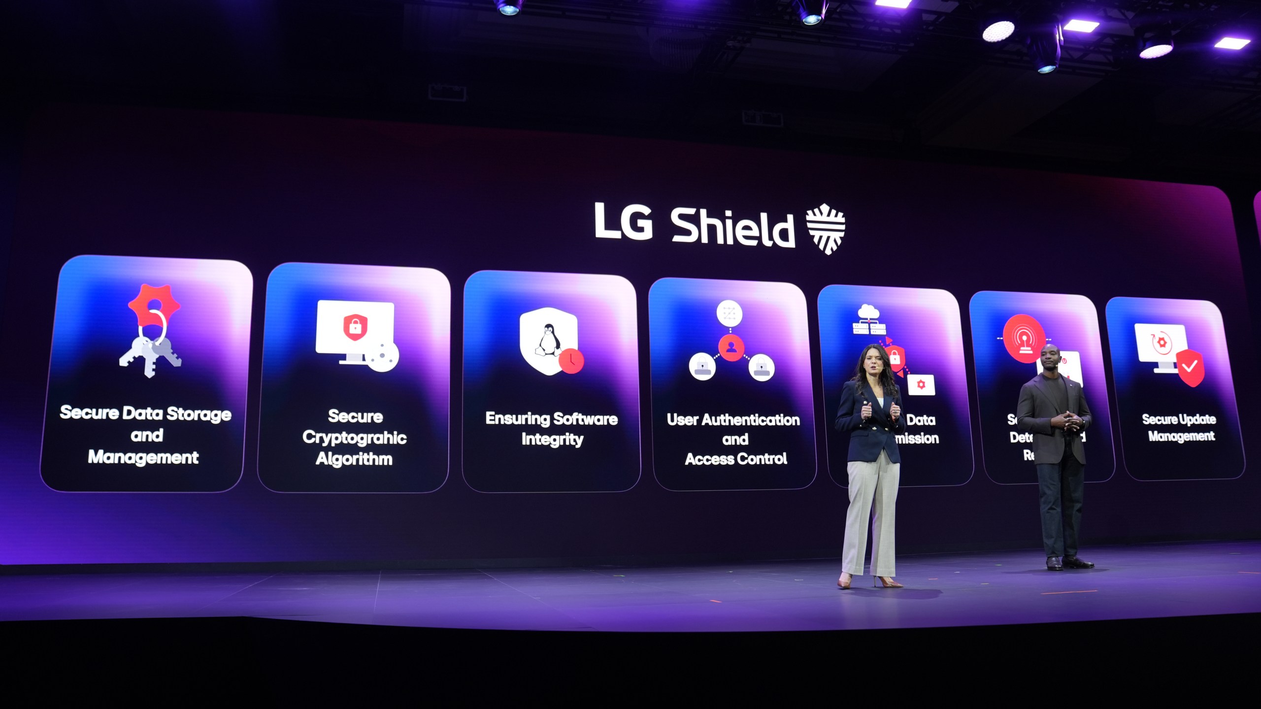 Angela Gozenput of home appliances and solution marketing and Aaron Westbrook of media entertainment and solution marketing, talk during an LG Electronics news conference ahead of the CES tech show Monday, Jan. 5, 2026, in Las Vegas. (AP Photo/Abbie Parr)