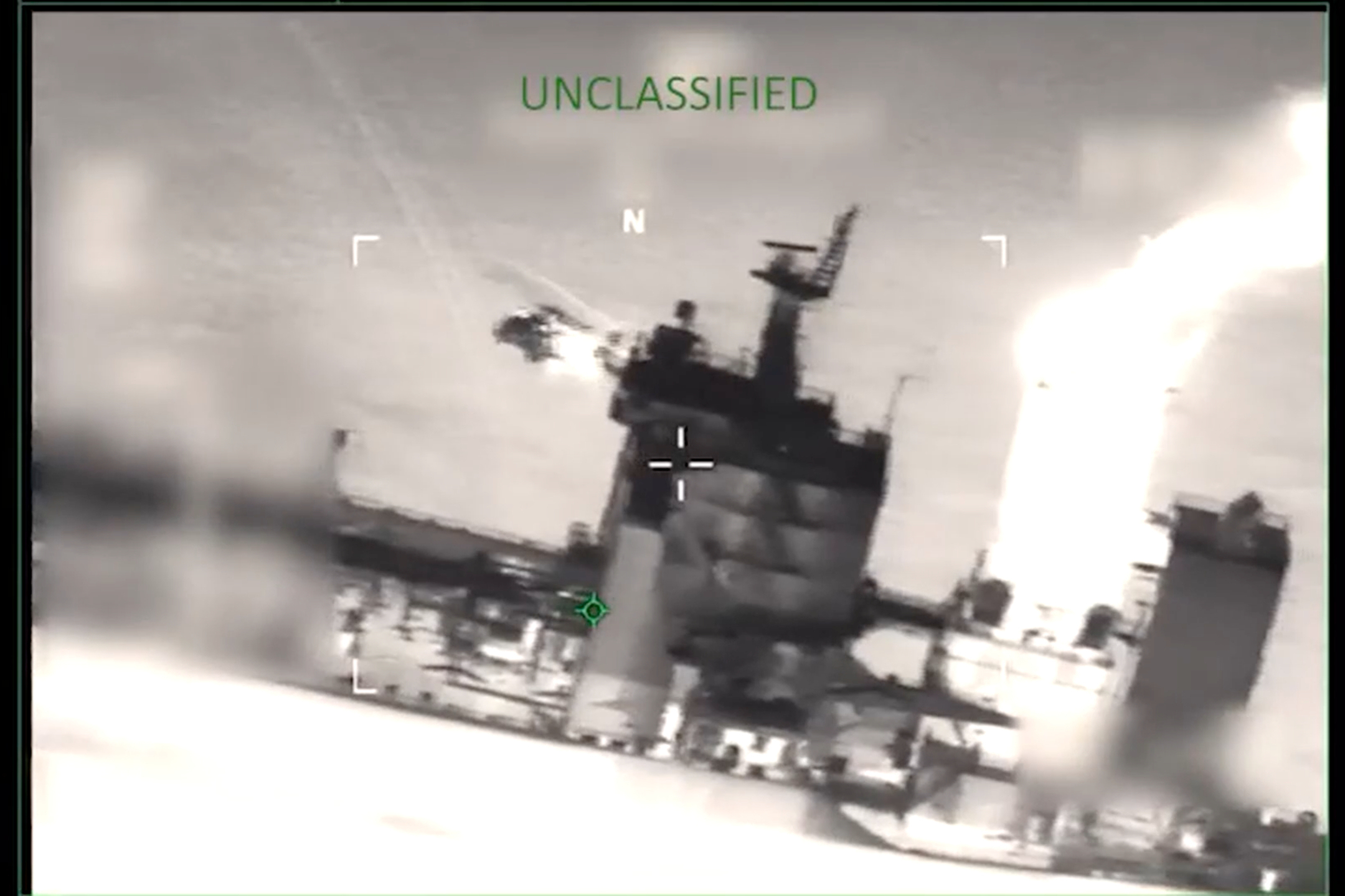 This image from video provided by the U.S. Department of Defense, shows U.S. forces boarding the M/T Sophia in the Caribbean Sea early Wednesday, Jan. 7, 2026. (Department of Defense via AP)