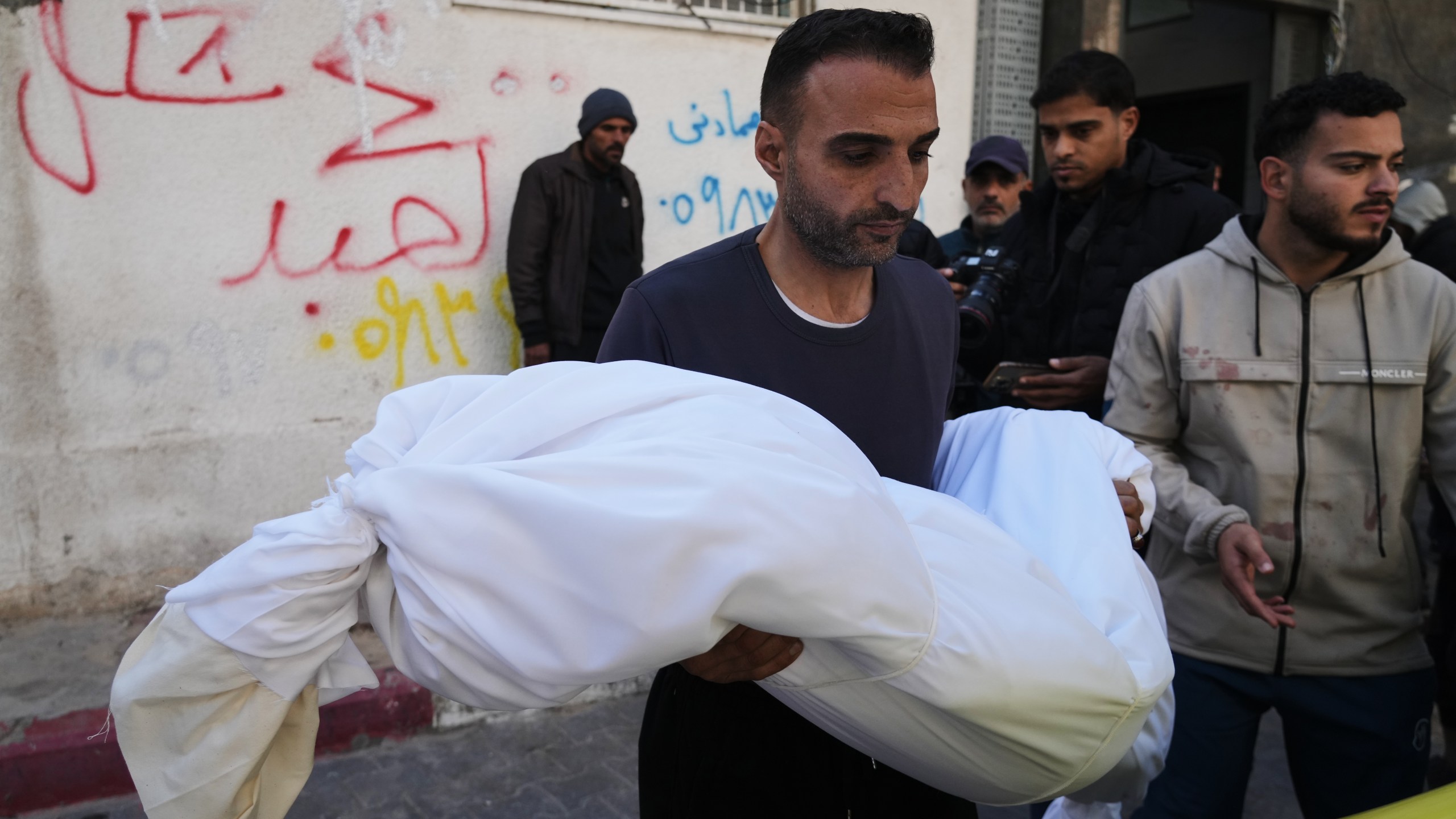 The body of 11-year-old Palestinian girl Hamsa Hosou, killed by Israeli fire in Jabalia, is brought to Shifa Hospital in Gaza City Thursday, Jan. 8, 2026. (AP Photo/Jehad Alshrafi)
