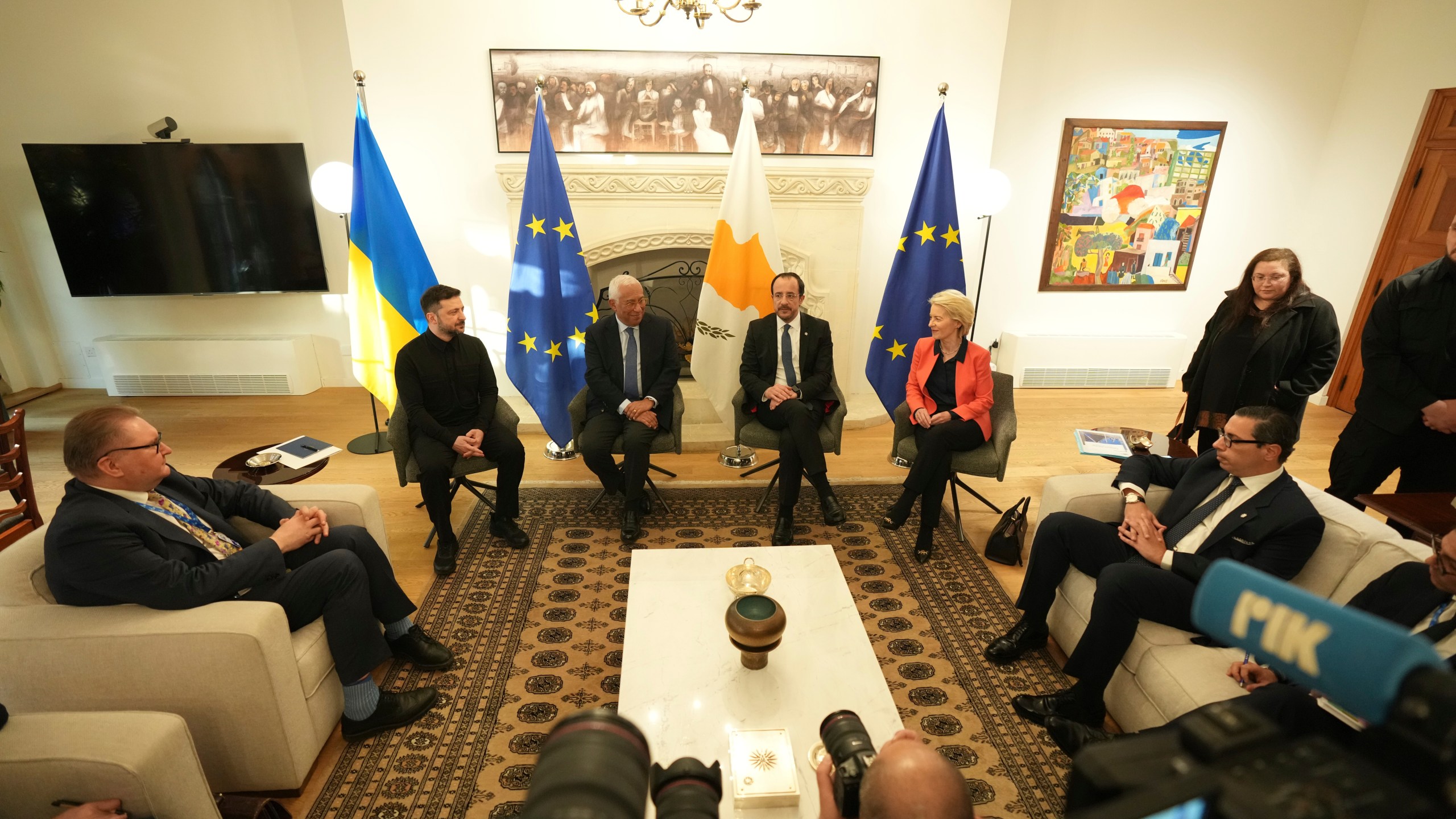 Ukraine's President Volodymyr Zelenskyy, left, European Council President Antonio Costa, second left, European Commission President Ursula von der Leyen, right, and Cyprus' President Nikos Christodoulides join a meeting at the presidential palace in Nicosia, Cyprus, Wednesday, Jan. 7, 2026. (AP Photo/Petros Karadjias, Pool)