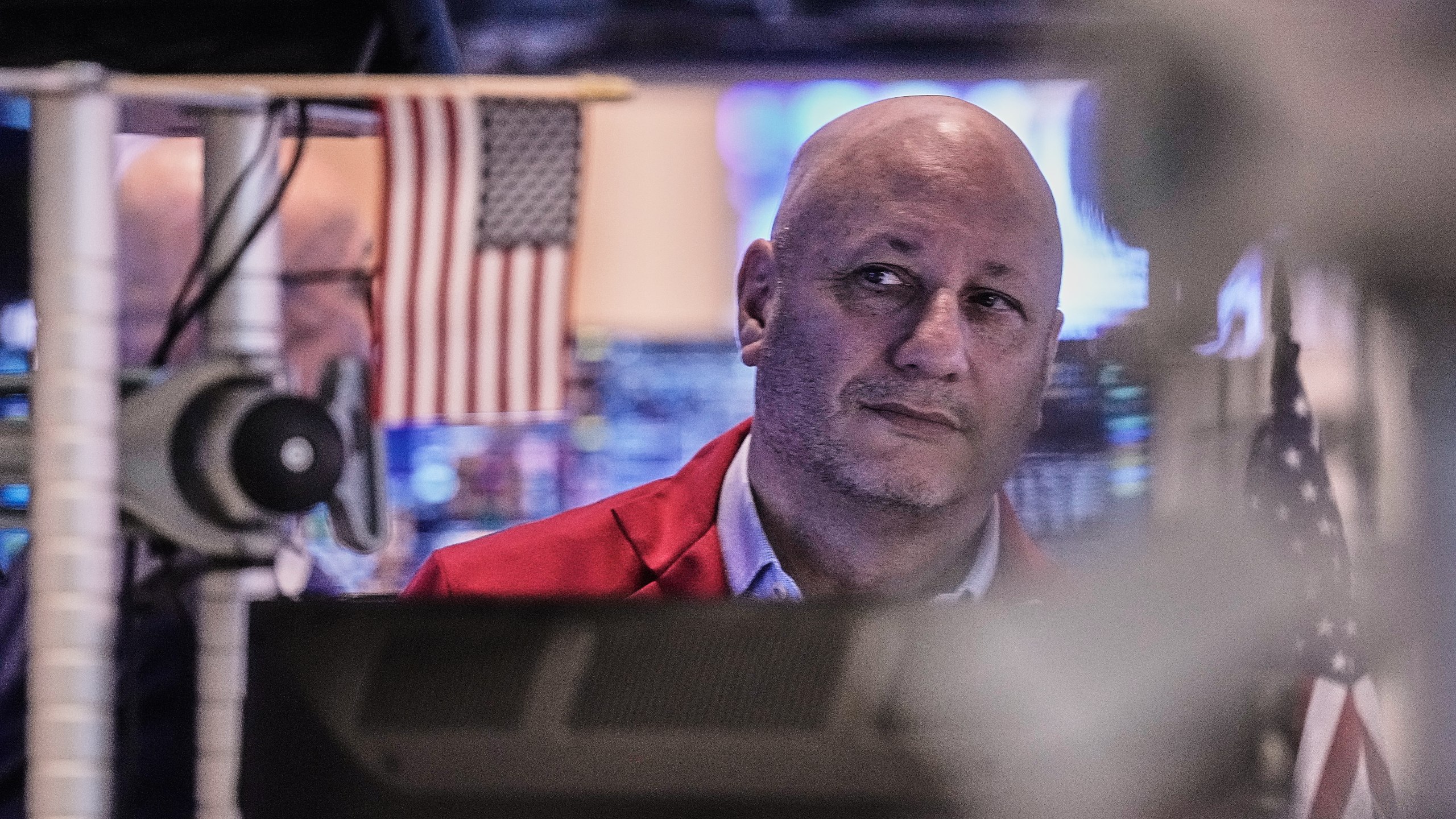 Trader John Mauro works on the floor of the New York Stock Exchange, Thursday, Jan. 8, 2026. (AP Photo/Richard Drew)