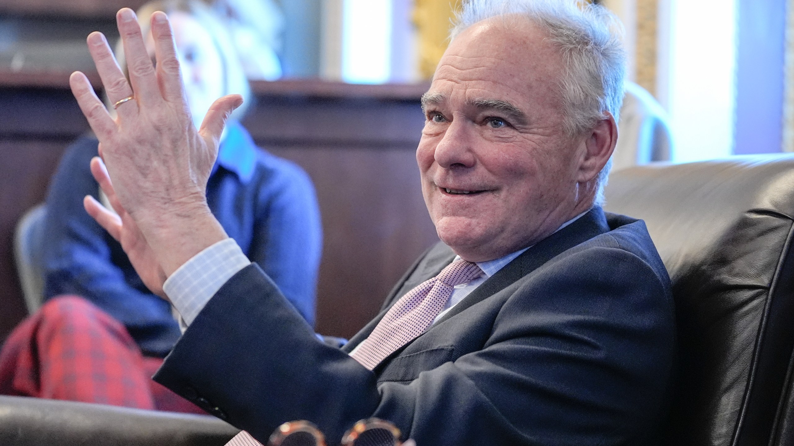 Sen. Tim Kaine, D-Va., speaks to reporters about a war powers resolution regarding Venezuela on Capitol Hill, Wednesday, Jan. 7, 2026, in Washington. (AP Photo/Mariam Zuhaib)