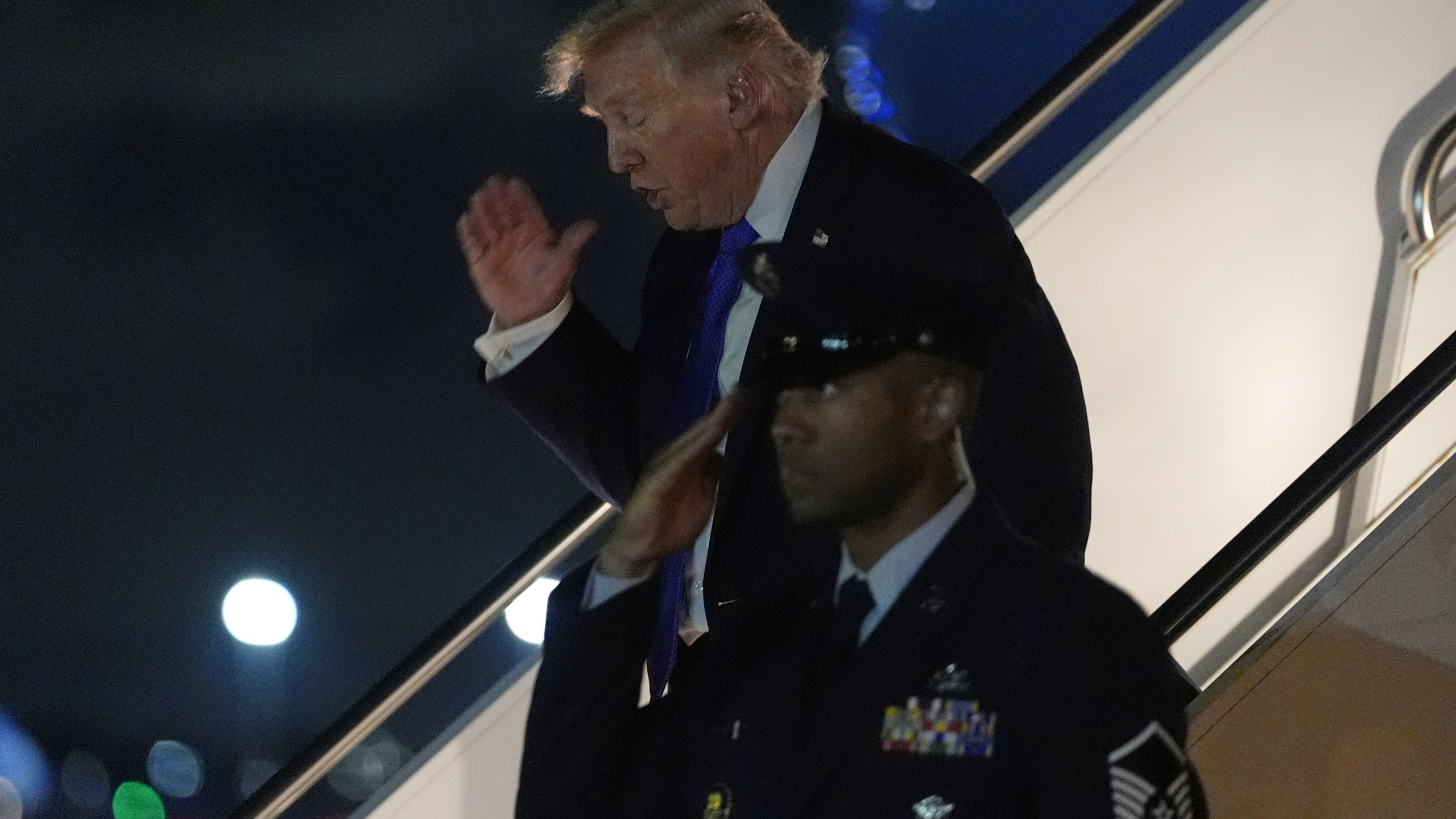 President Donald Trump arrives on Air Force One at Palm Beach International Airport, Friday, Jan. 9, 2025, in West Palm Beach, Fla. (AP Photo/Julia Demaree Nikhinson)
