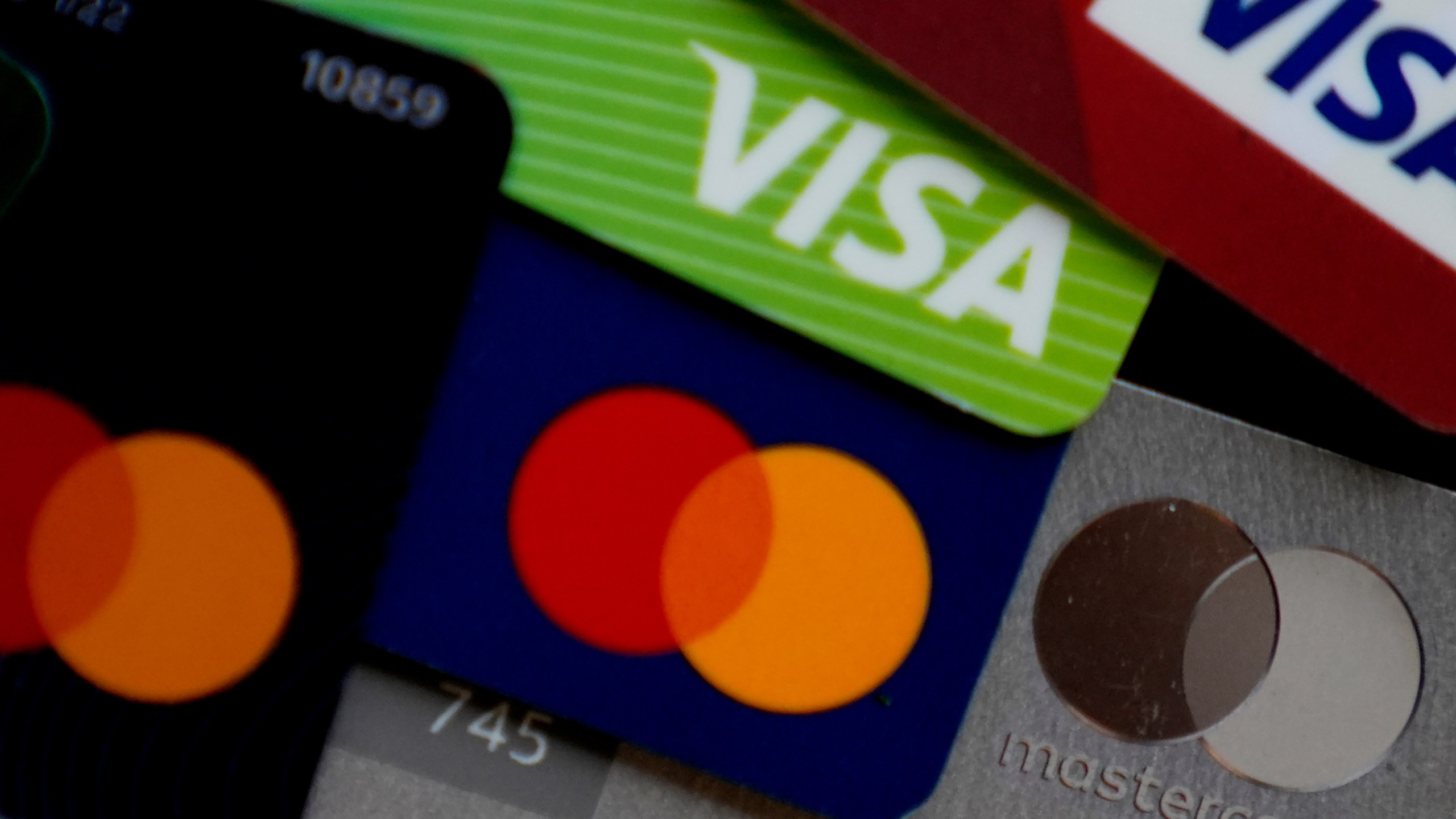 Visa and Mastercard credit cards are shown.