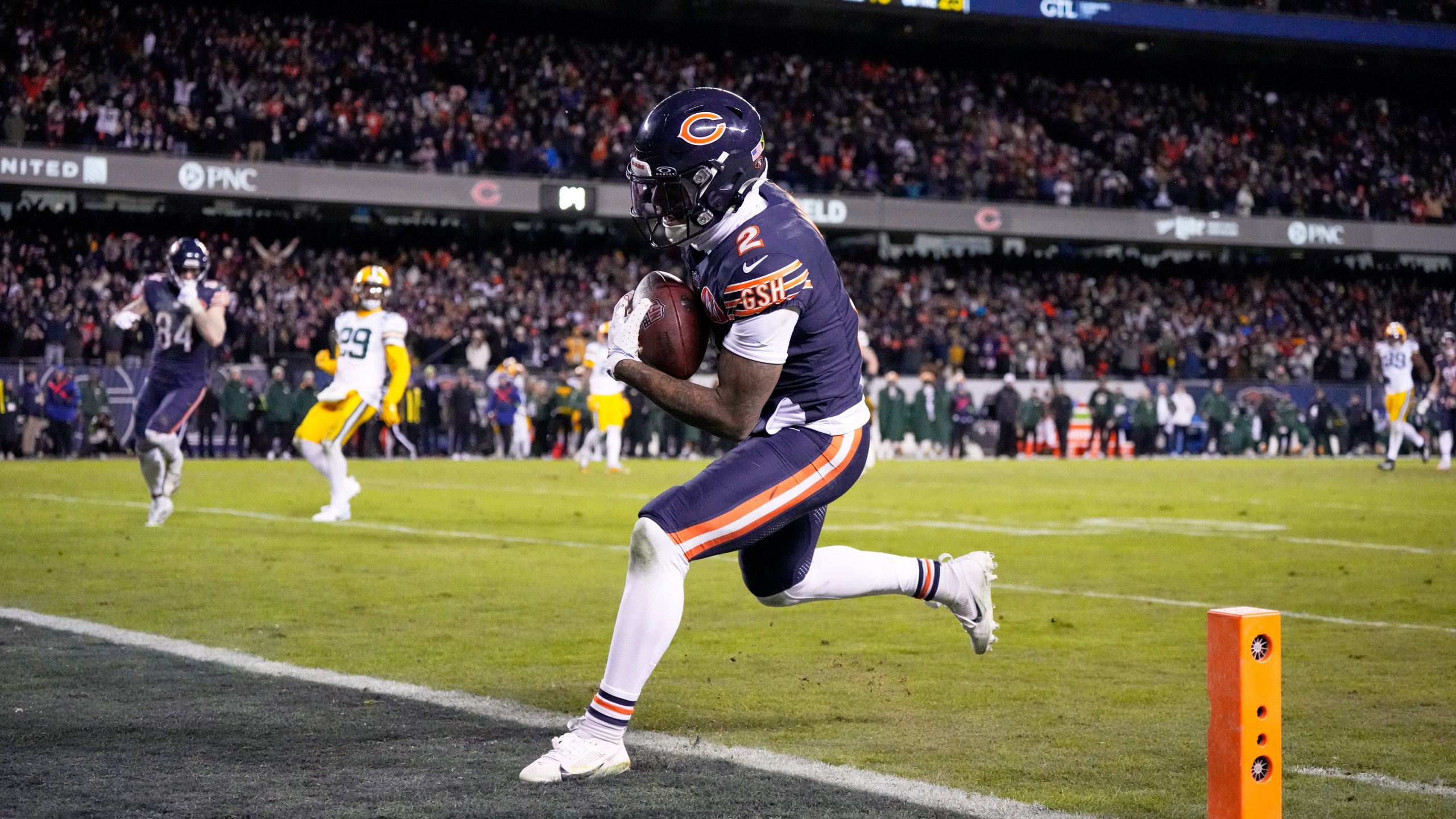 Chicago Bears' DJ Moore catches a touchdown pass during the second half of an NFL wild-card playoff football game against the Green Bay Packers Saturday, Jan. 10, 2026, in Chicago. (AP Photo/Nam Huh)